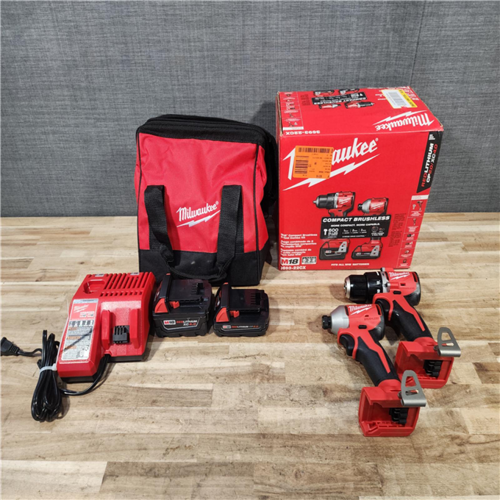 HOUSTON LOCATION - AS-IS Milwaukee 18-Volt Lithium-Ion Brushless Cordless Compact Hammer Drill/Impact Combo Kit