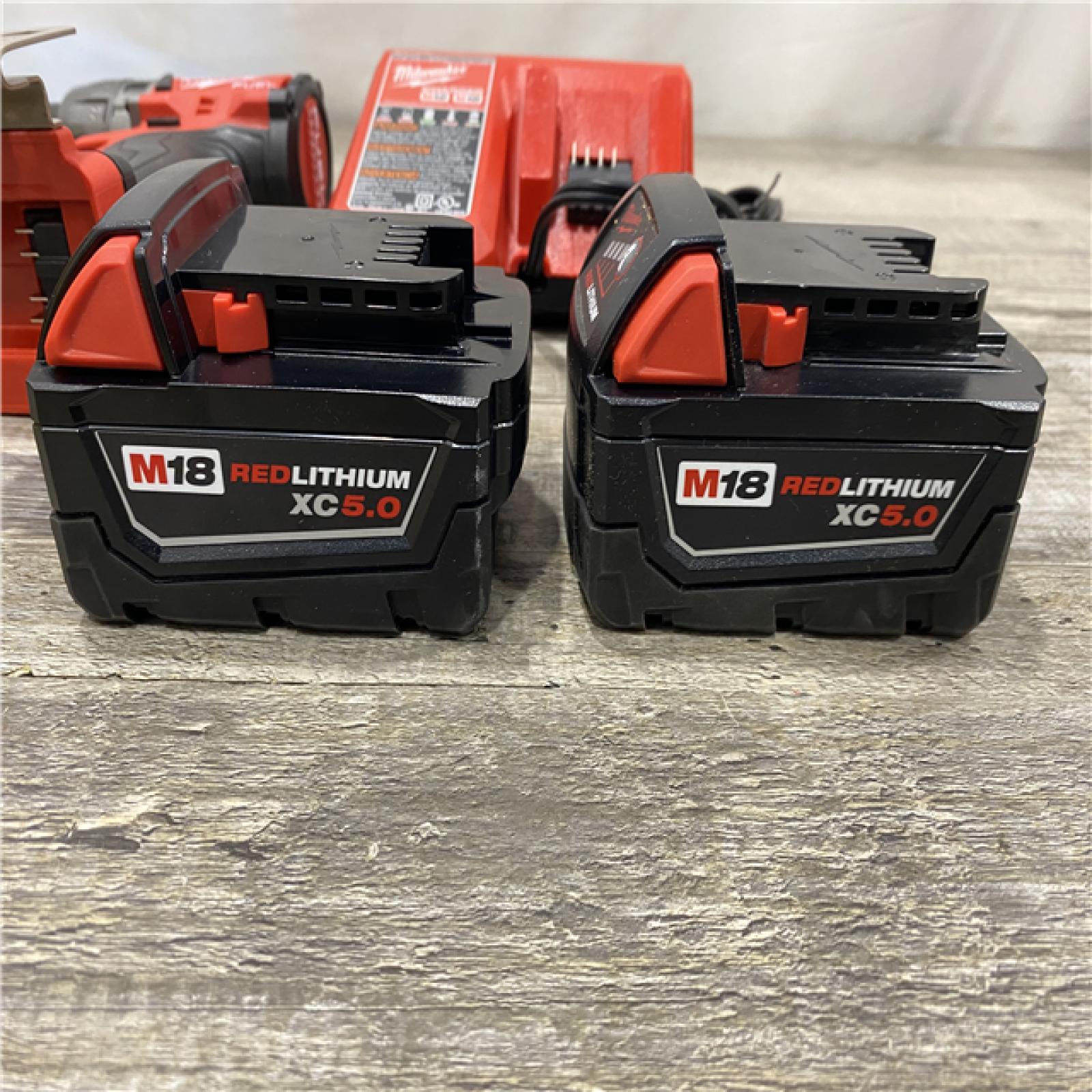 AS-IS Milwaukee FUEL 18V Lithium-Ion Brushless Cordless 1/2 in. Hammer Drill Driver Kit