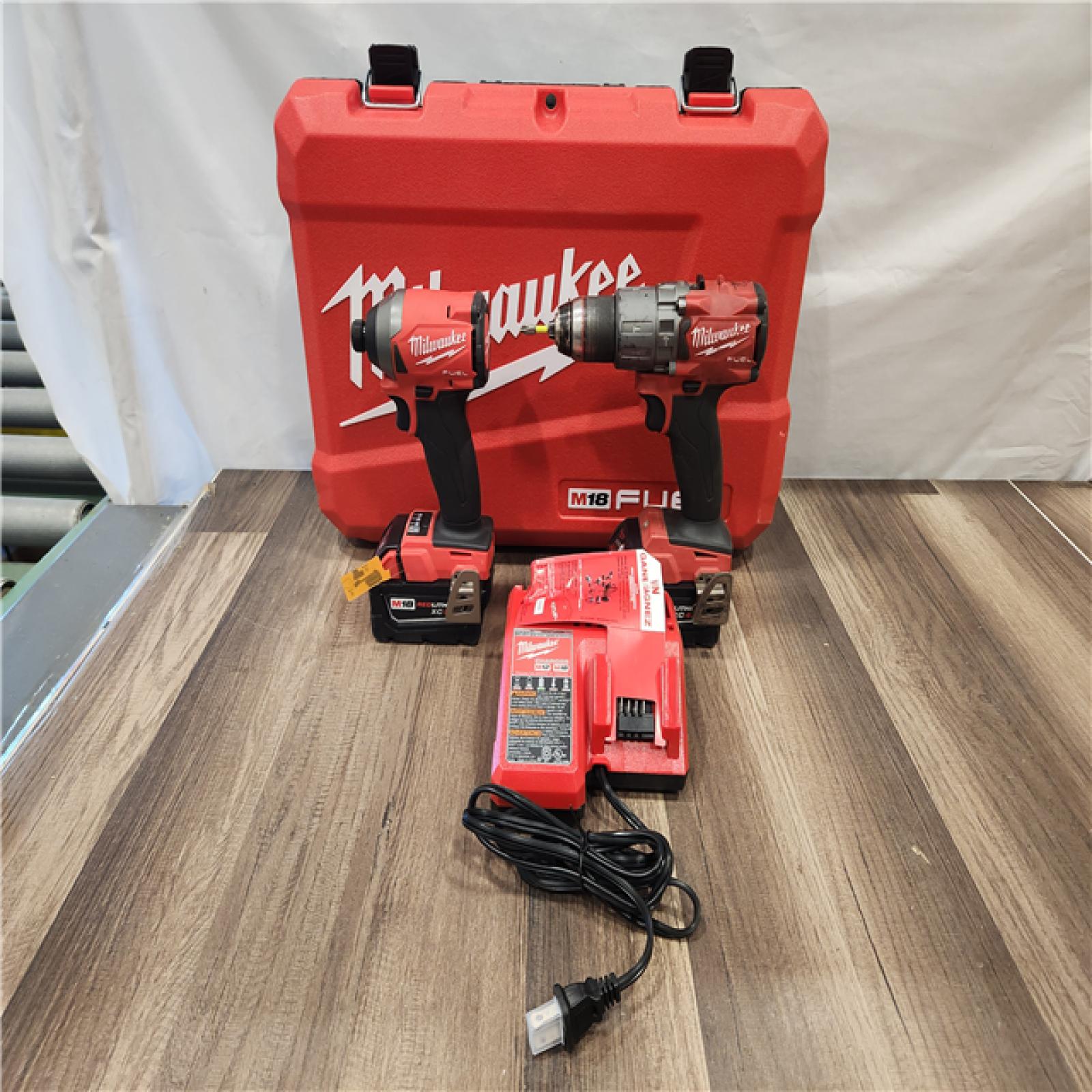 AS-IS- MILWAUKEE FUEL 18V Lithium-Ion Brushless Cordless Hammer Drill and Impact Driver Combo Kit