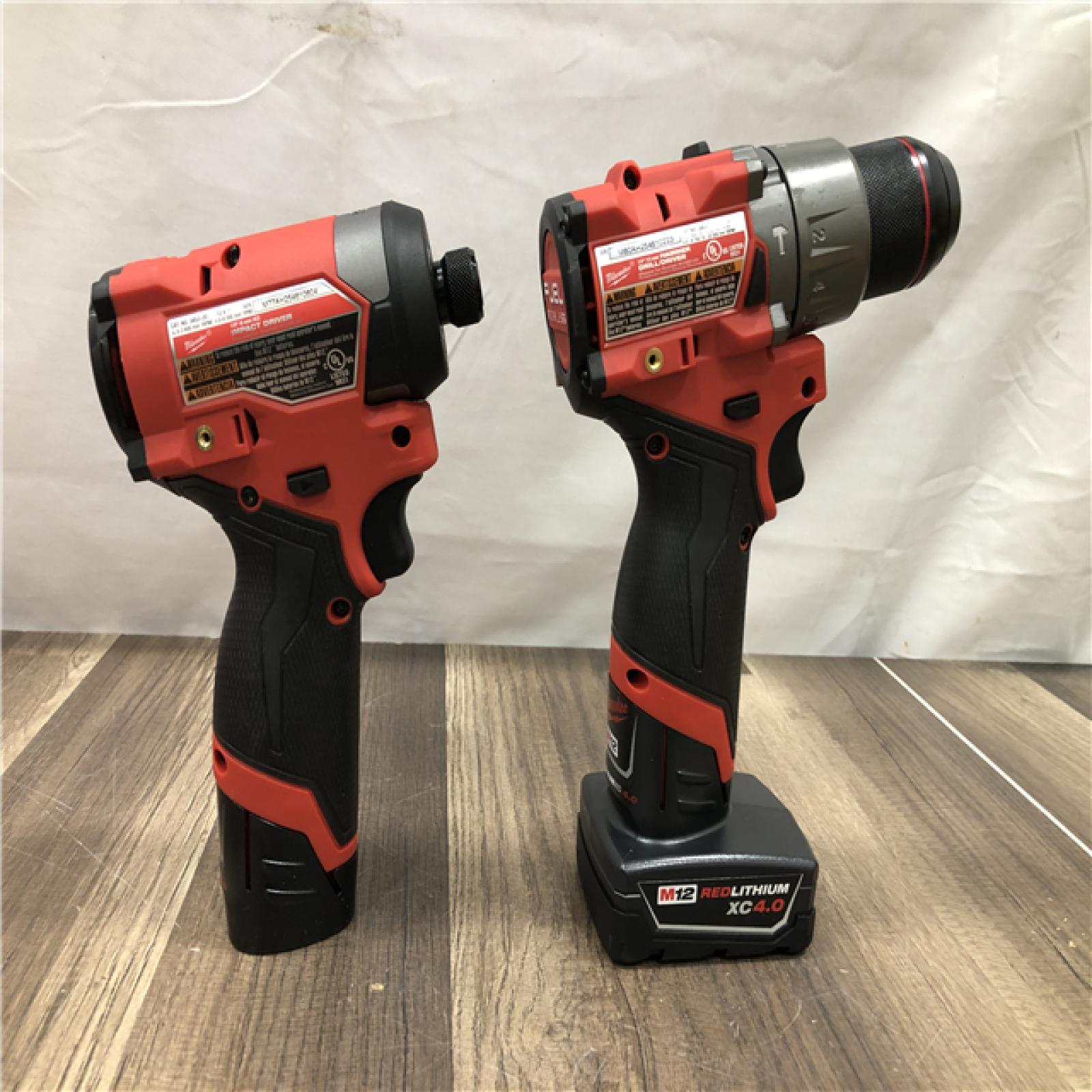 AS-IS Milwaukee  FUEL 12-Volt Lithium-Ion Brushless Cordless Hammer Drill and Impact Driver Combo Kit