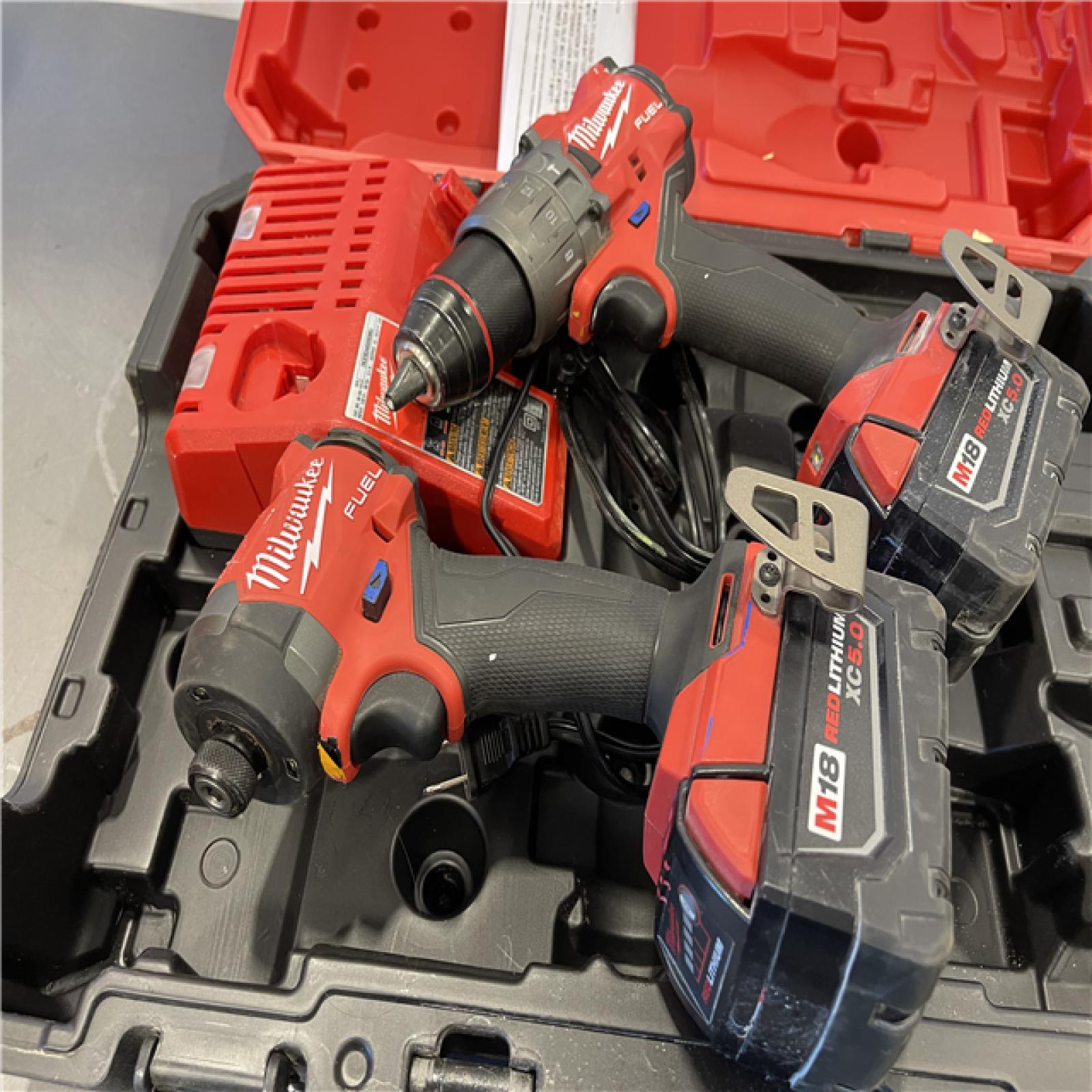 AS-IS- MILWAUKEE M18 FUEL 18V Lithium-Ion Brushless Cordless Hammer Drill and Impact Driver Combo Kit