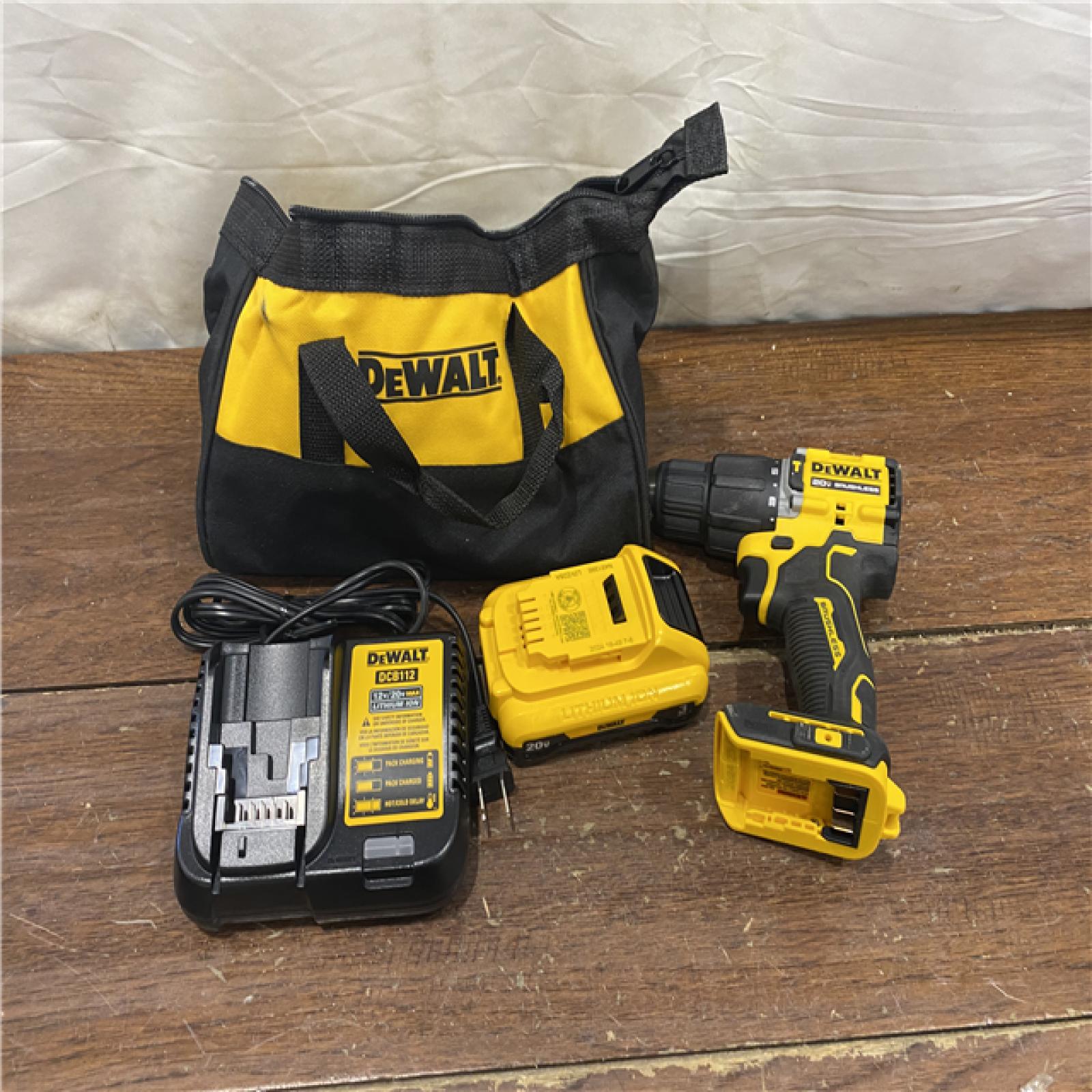 AS-IS DEWALT ATOMIC 20-Volt Lithium-Ion Cordless 1/2 in. Compact Hammer Drill with 3.0Ah Battery, Charger and Bag
