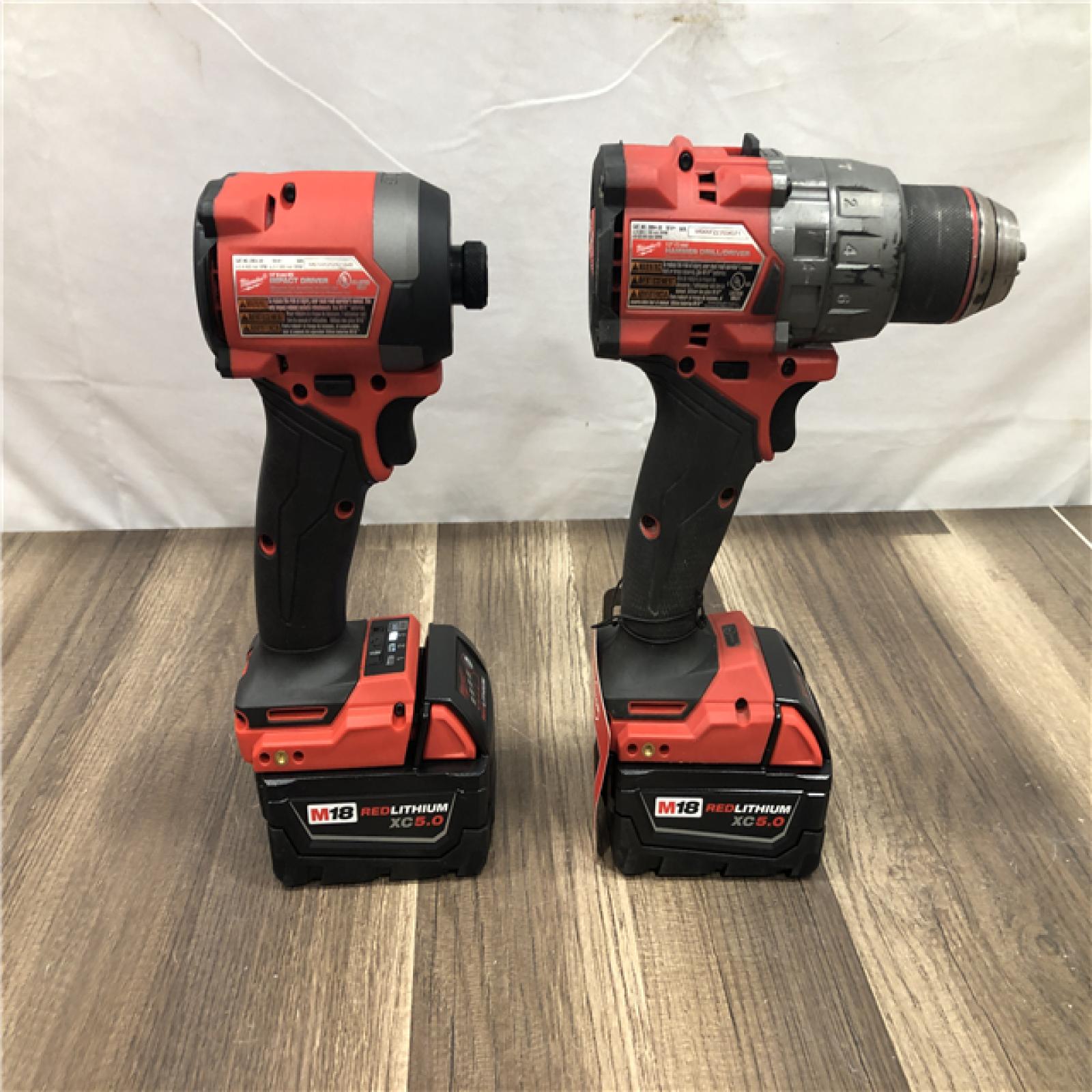 AS-IS Milwaukee FUEL 18V Lithium-Ion Brushless Cordless Hammer Drill and Impact Driver Combo Kit