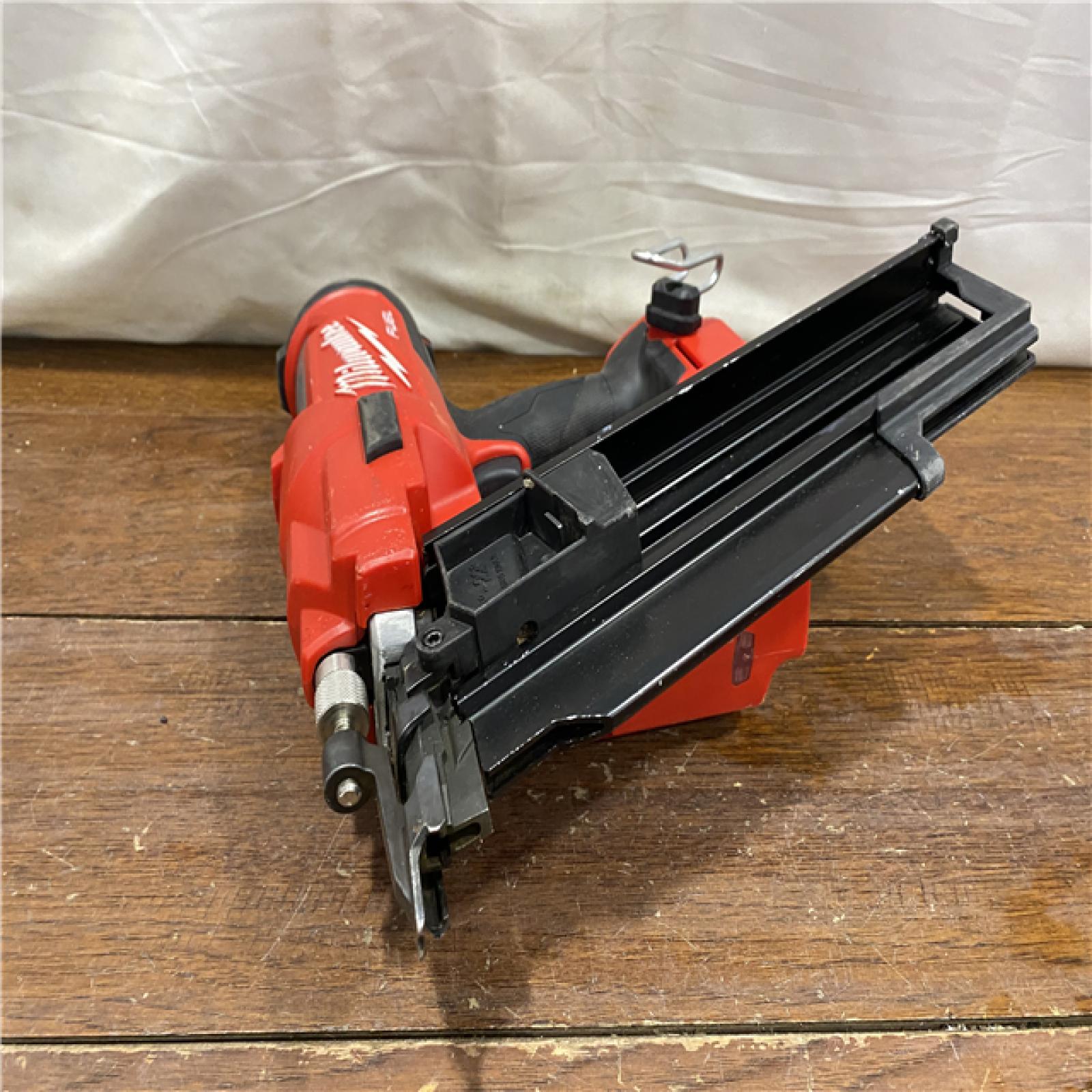 AS-IS Milwaukee 2744-20 M18 FUEL 3-1/2 in. 18-Volt 21-Degree Lithium-Ion Brushless Cordless Framing Nailer (Tool-Only)