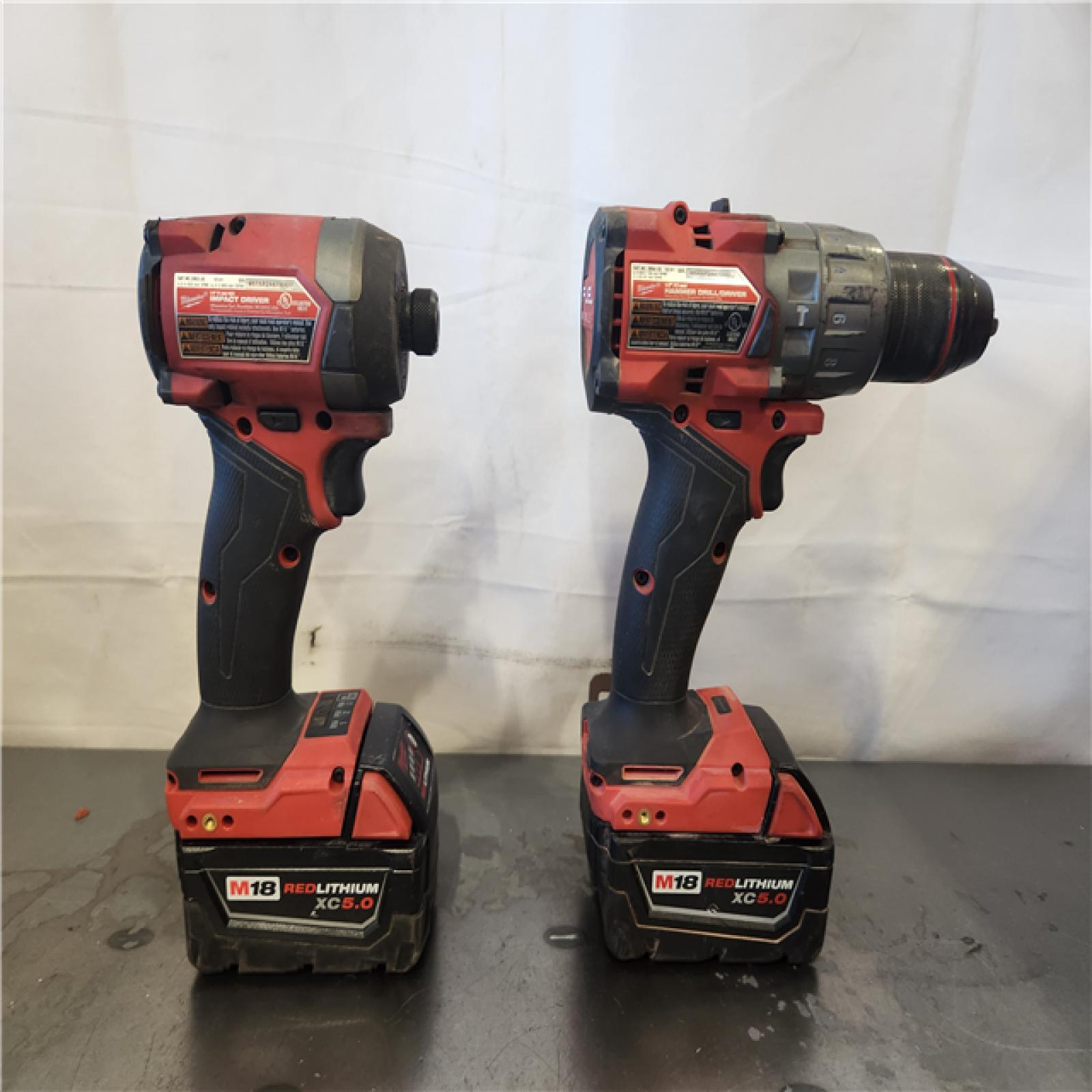 AS-IS- Milwaukee FUEL 18V Lithium-Ion Brushless Cordless Hammer Drill and Impact Driver Combo Kit