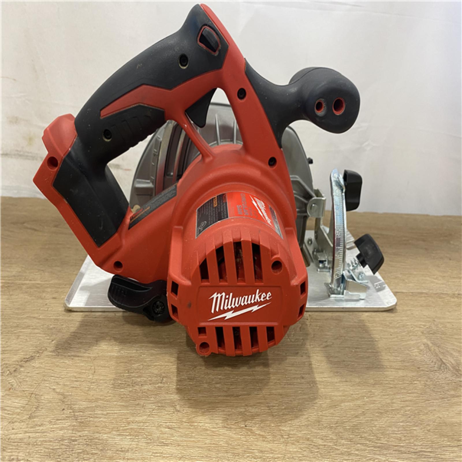 AS-IS Milwaukee 18V Lithium-Ion Cordless 6-1/2 in. Circular Saw (Tool-Only)