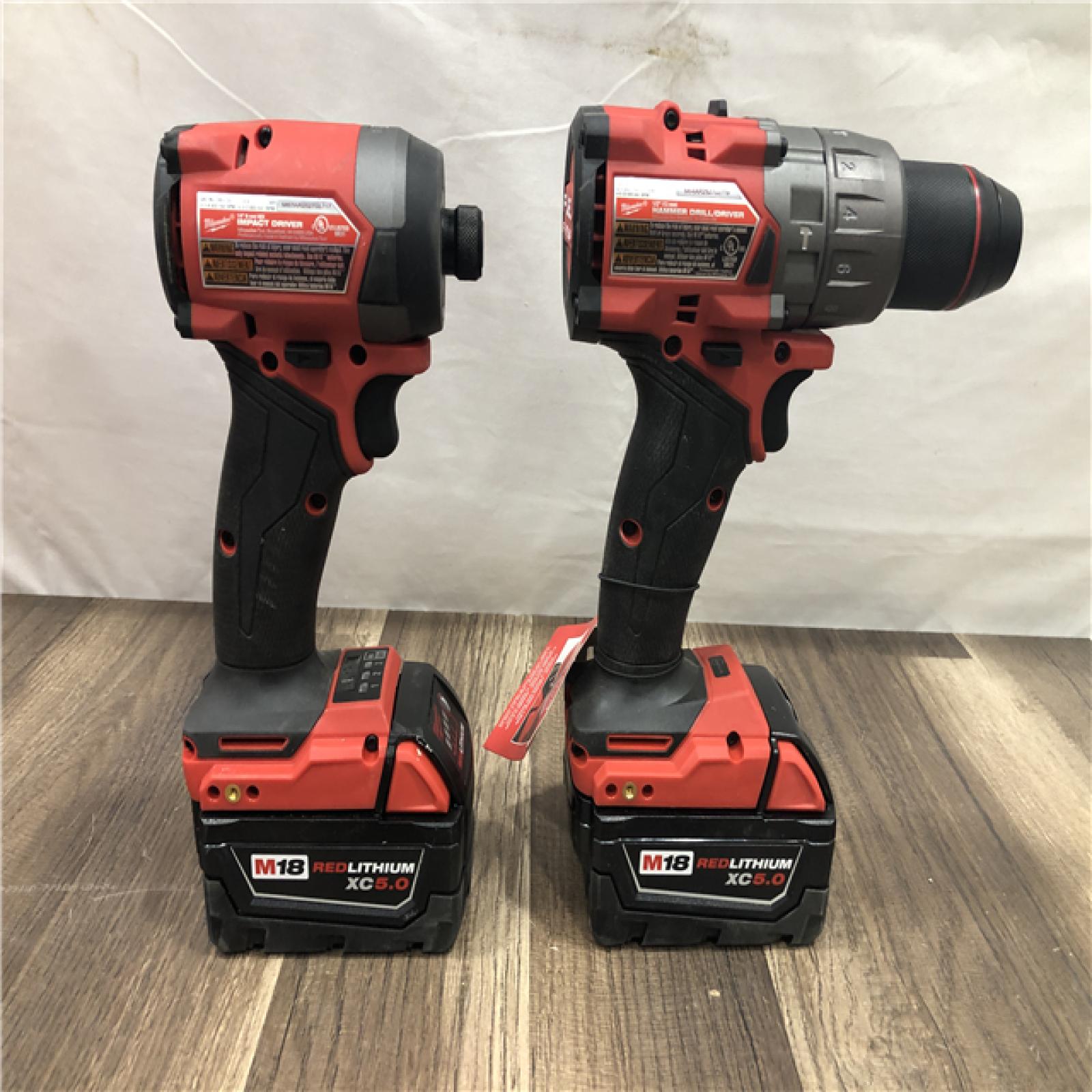 AS-IS Milwaukee  FUEL 18V Lithium-Ion Brushless Cordless Hammer Drill and Impact Driver Combo Kit