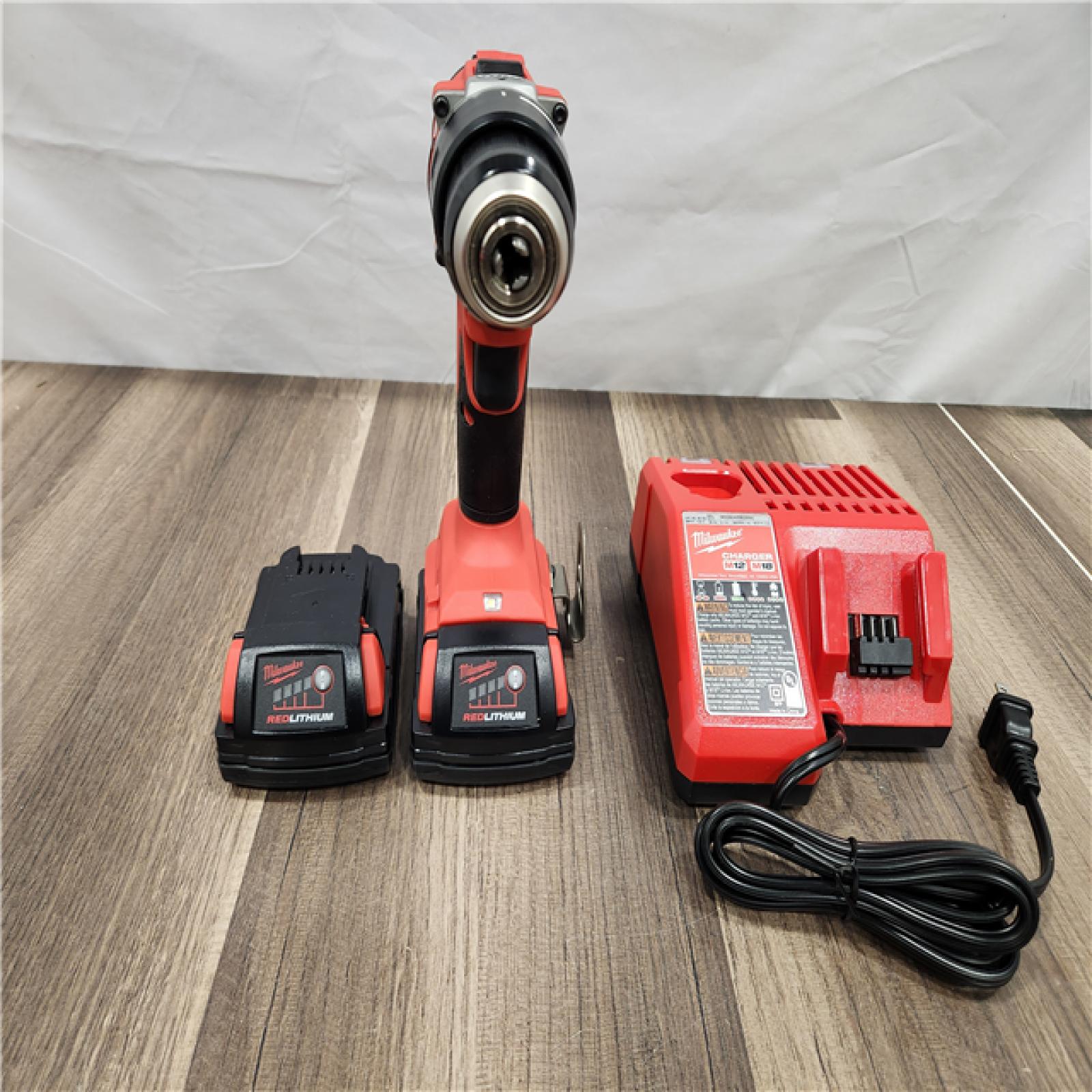 AS-IS -  Milwaukee M18 18V Lithium-Ion Brushless Cordless 1/2 in. Compact Drill/Driver Kit with Two 2.0 Ah Batteries, Charger and Case