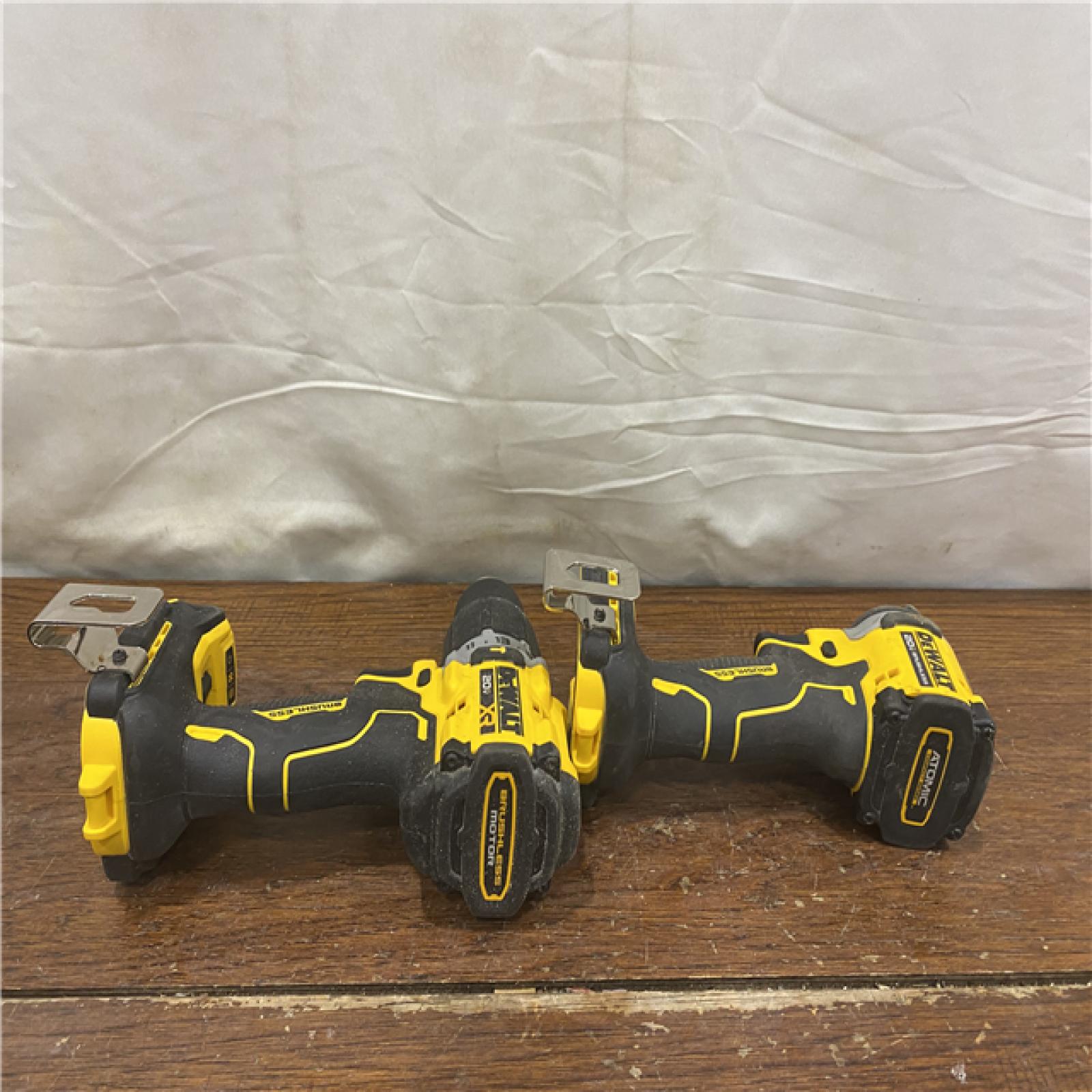 AS-IS DEWALT 20V MAX XR Hammer Drill and ATOMIC Impact Driver 2 Tool Cordless Combo Kit with (2) 4.0Ah Batteries, Charger, and Bag