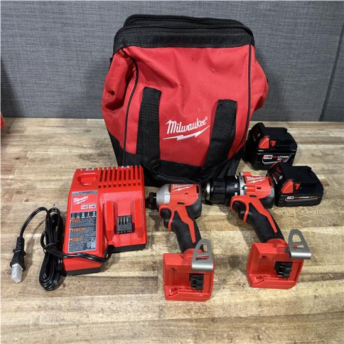 Houston Location AS-IS Milwaukee Hammer Drill Driver and Impact Driver and Batteries QTY/2 with Charger