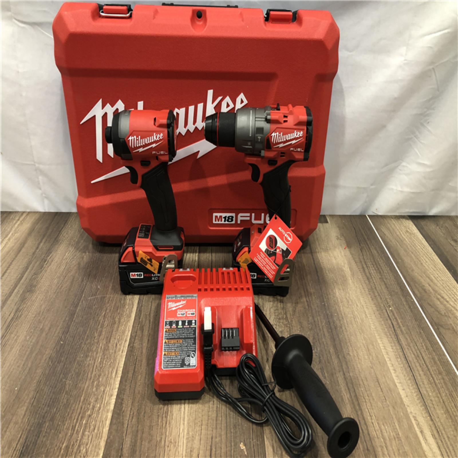 AS-IS Milwaukee FUEL 18V Lithium-Ion Brushless Cordless Hammer Drill and Impact Driver Combo Kit
