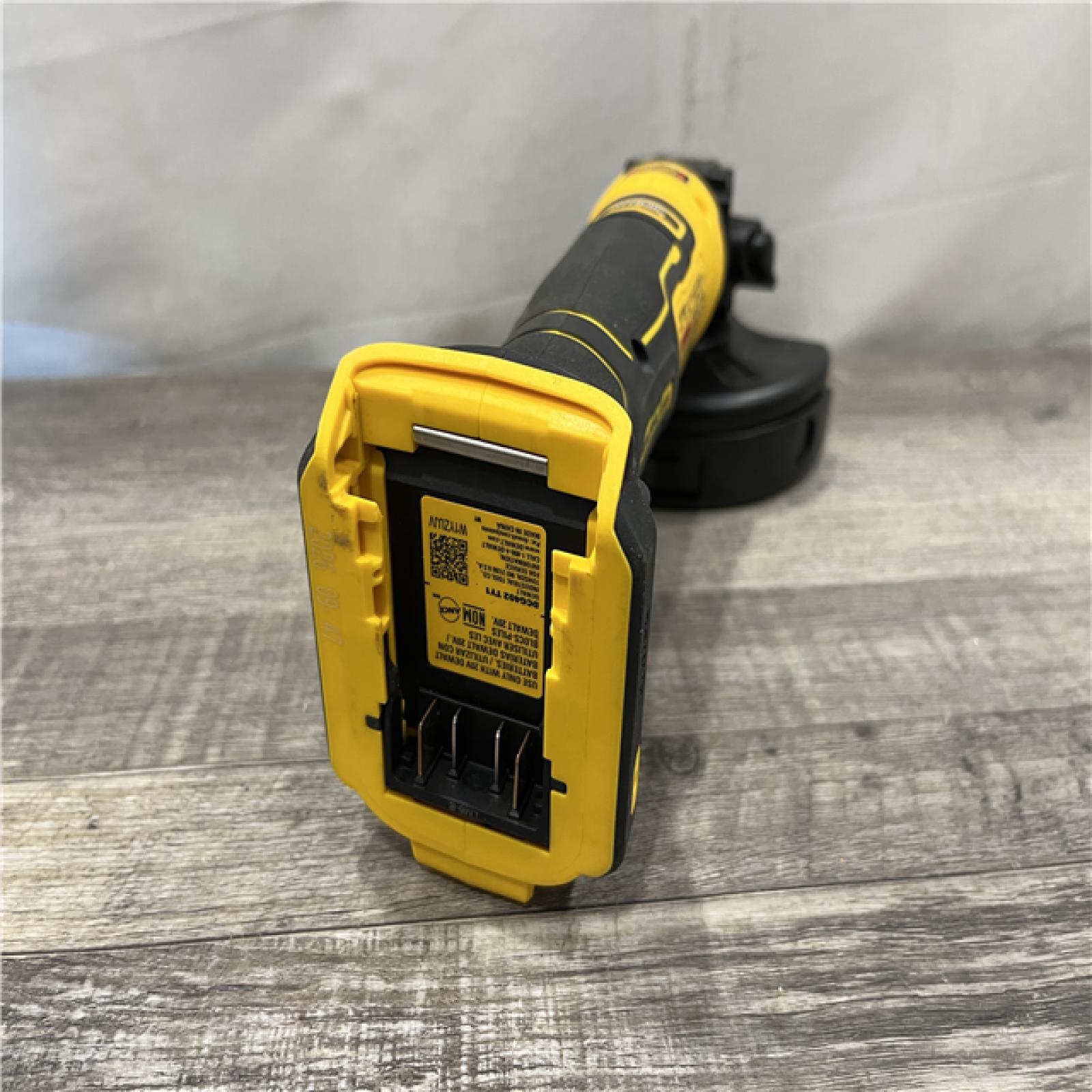 AS-IS DEWALT ATOMIC 20V MAX Cordless 4-1/2 in. Angle Grinder with Paddle Switch (Tool Only)