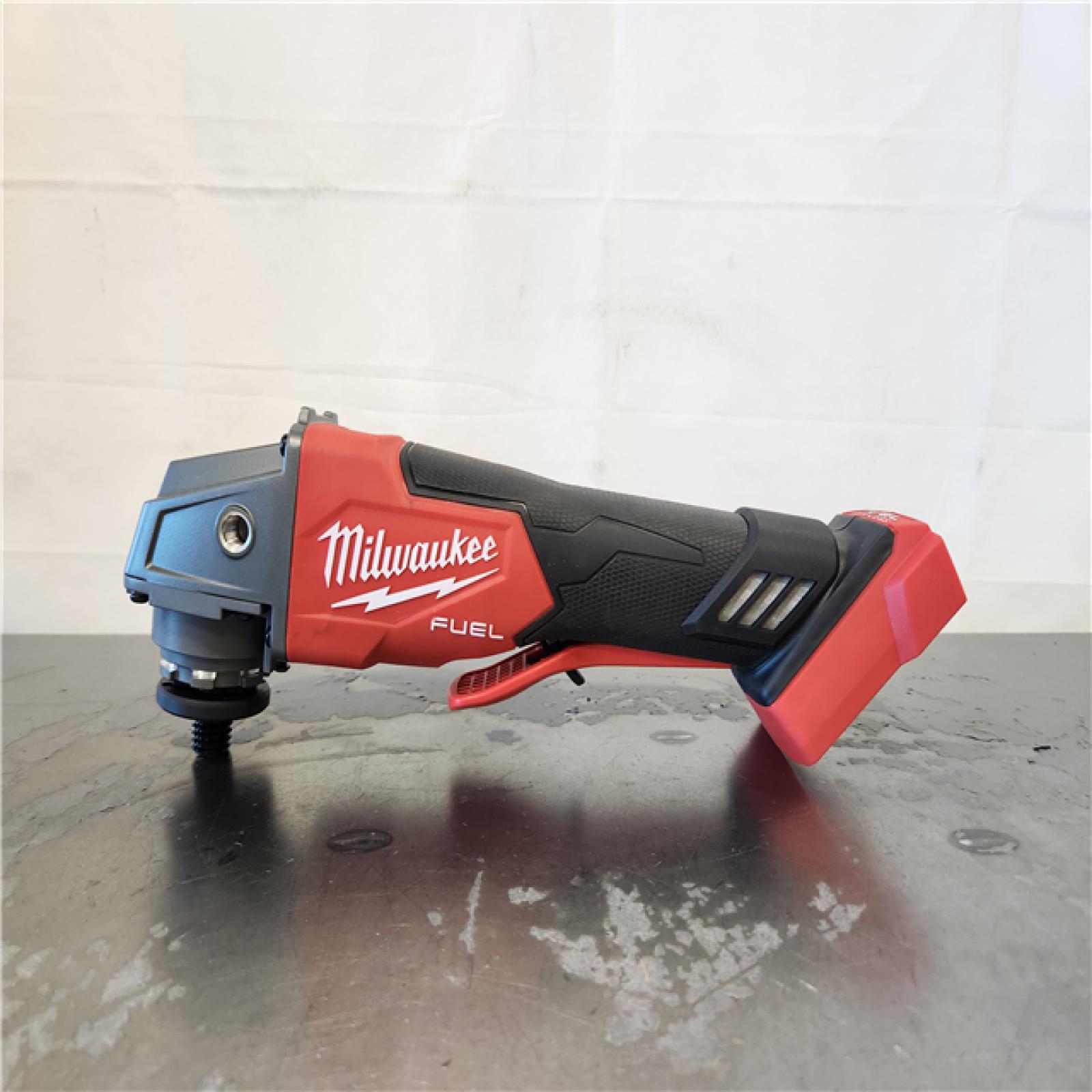 AS-IS- Milwaukee FUEL 18-Volt Lithium-Ion Brushless Cordless 4-1/2 in./5 in. Grinder W/Paddle Switch (Tool-Only)
