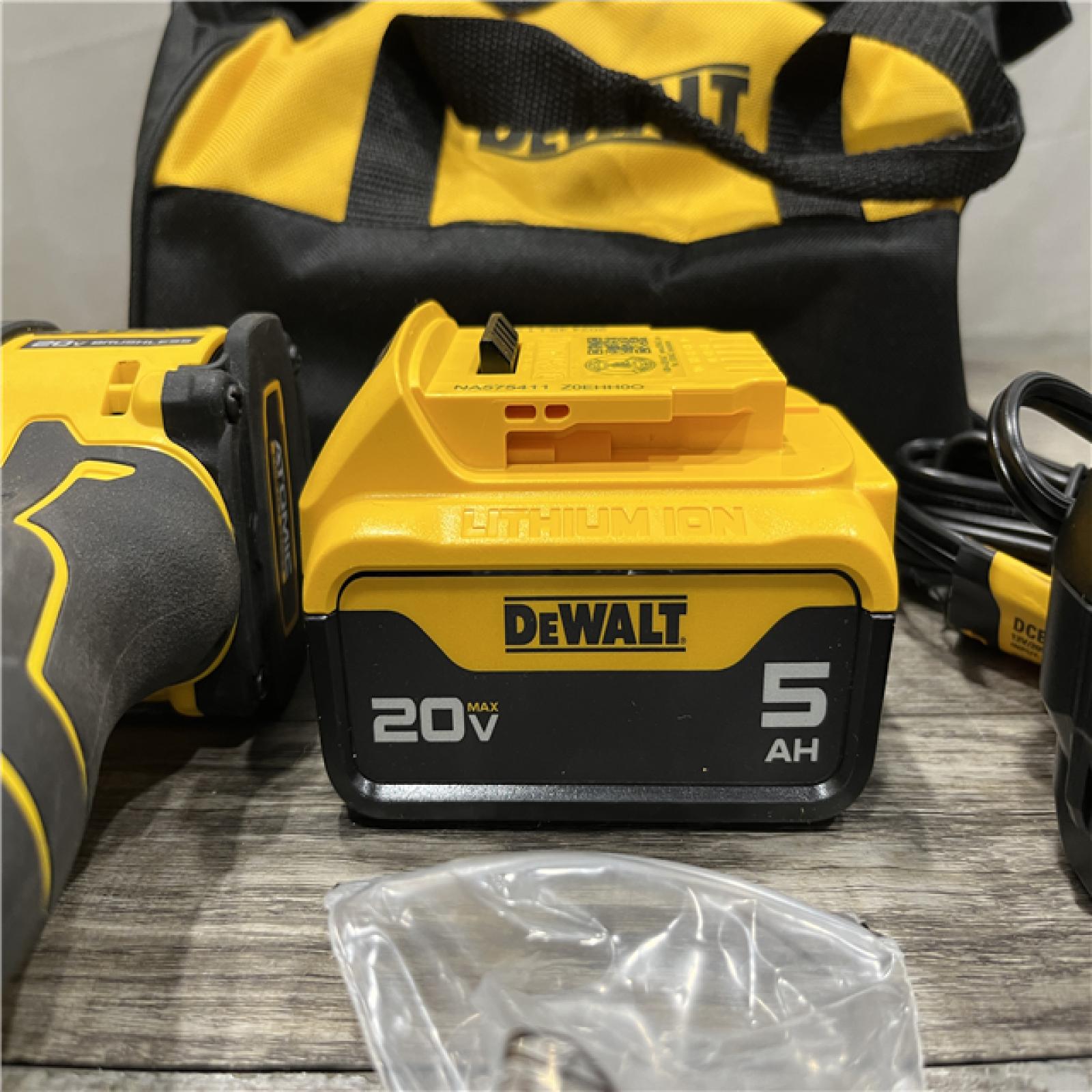 AS-IS DEWALT ATOMIC 20V MAX Lithium-Ion Cordless 1/4 in. Brushless Impact Driver Kit