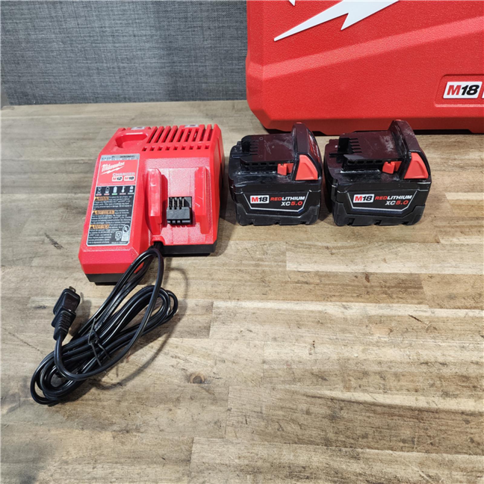 HOUSTON LOCATION - AS-IS Milwaukee FUEL 18V Lithium-Ion Brushless Cordless Hammer Drill and Impact Driver Combo Kit