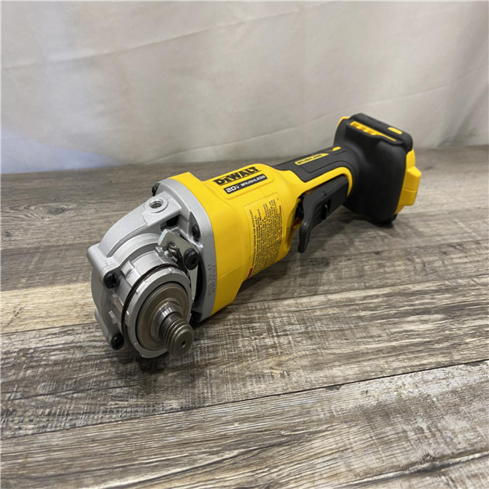 AS-IS DEWALT 20V MAX Cordless Brushless 4-1/2 in. Angle Grinder with Paddle Switch (Tool Only)