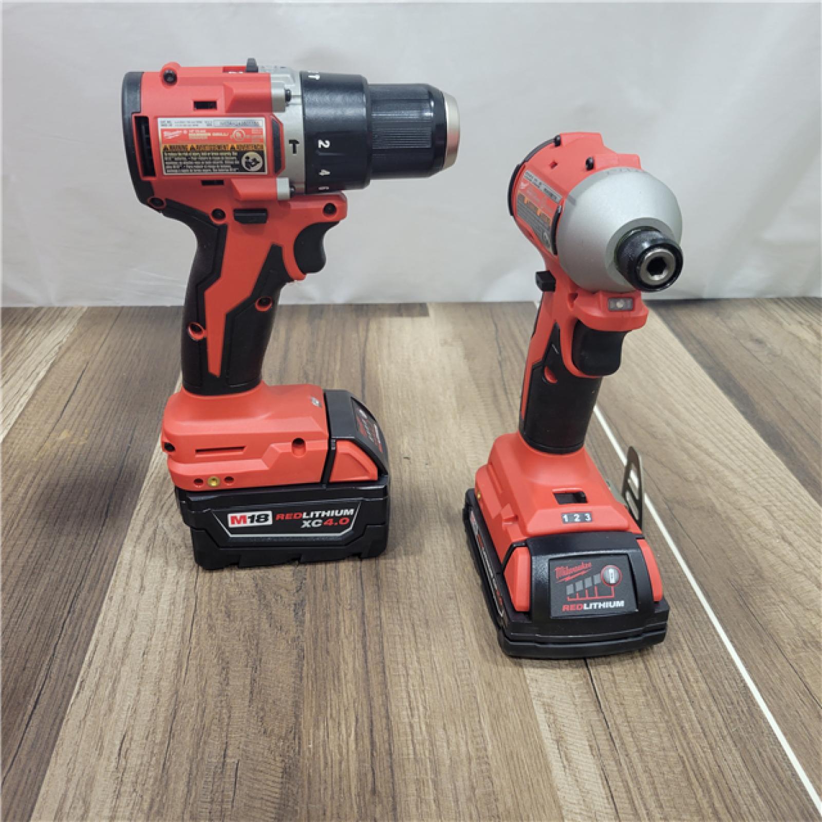 AS-IS  Milwaukee M18 18-Volt Lithium-Ion Brushless Cordless Compact Hammer Drill/Impact Combo Kit (2-Tool) with (2) Batteries, Bag