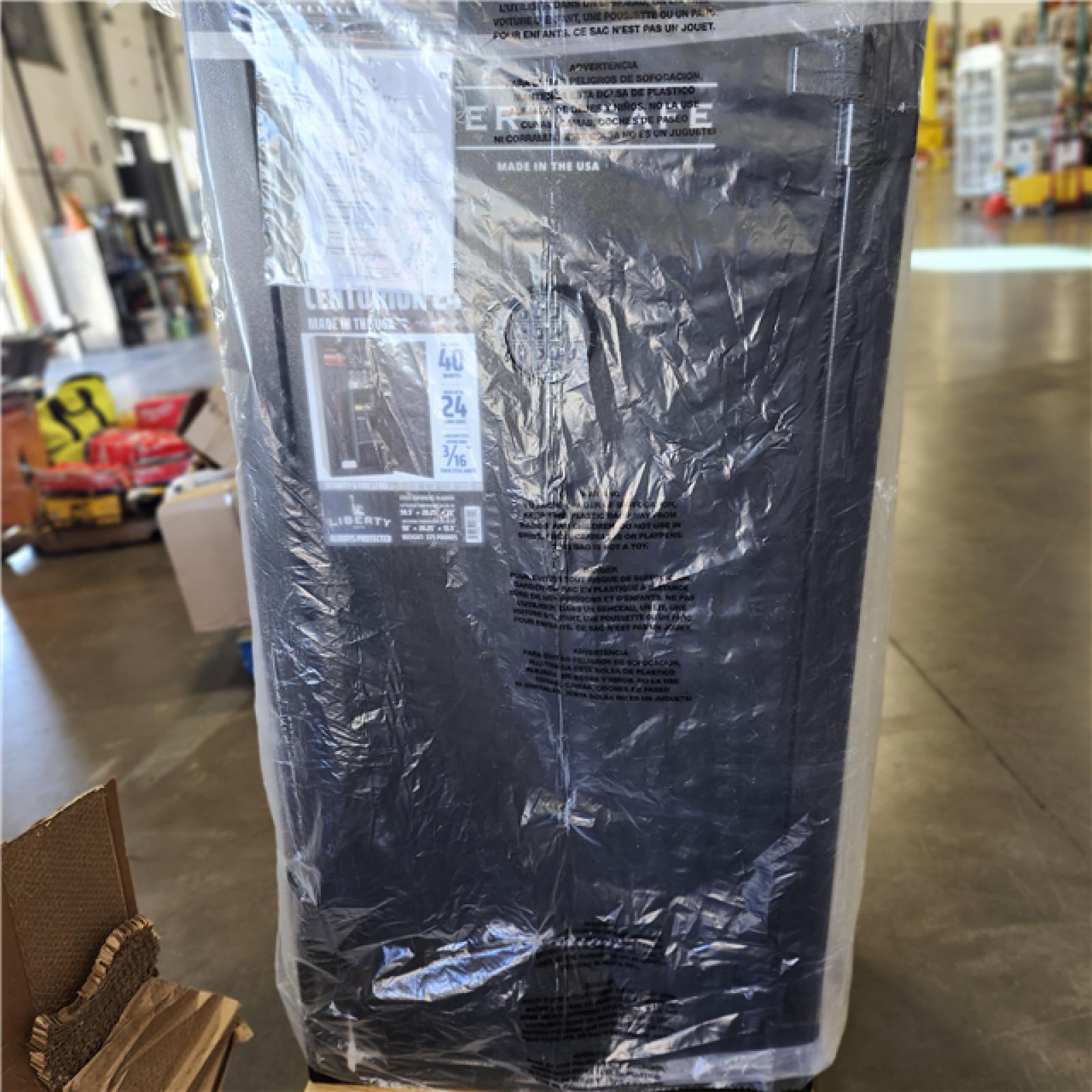 DALLAS LOCATION- LIBERTY SAFE Centurion 24-Gun 40-min fire rating EMP E-Lock  59.25 in H x 28.25 in W x 20 in. L  Black Gun Safe