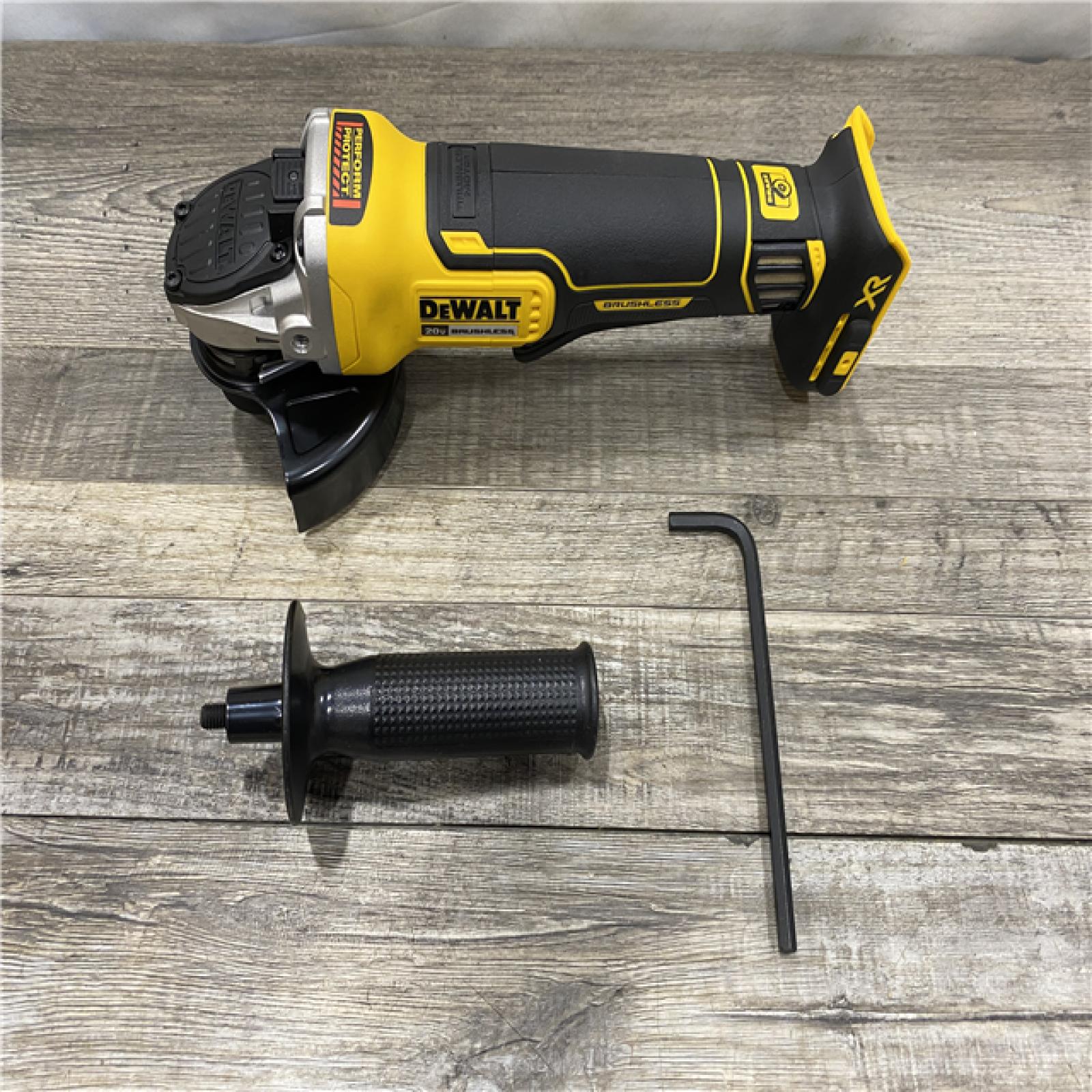AS-IS DEWALT 20V MAX XR Cordless Brushless 4.5 in. Paddle Switch Small Angle Grinder with Kickback Brake (Tool Only)