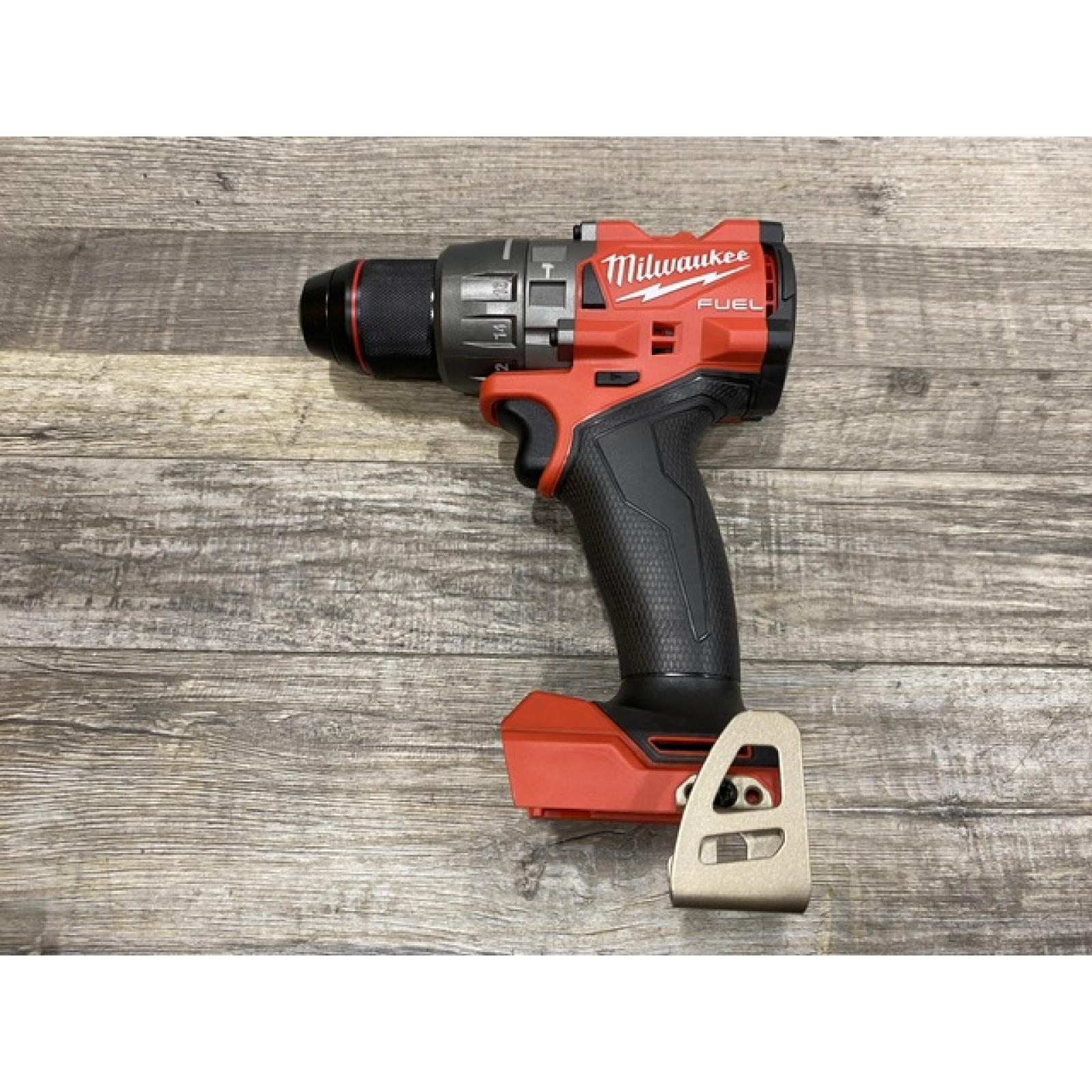 AS-IS Milwaukee FUEL 18V Lithium-Ion Brushless Cordless 1/2 in. Hammer Drill Driver Kit