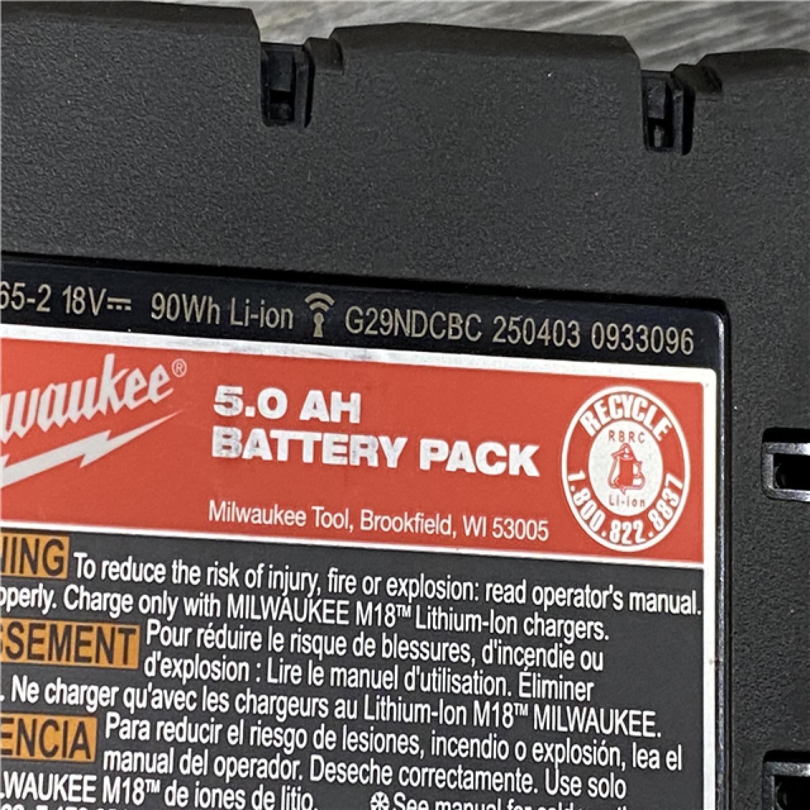 AS-IS Milwaukee FUEL SURGE 18V Lithium-Ion Brushless Cordless 1/4 in. Hex Impact Driver with (2) 5.0 Ah Battery and Charger