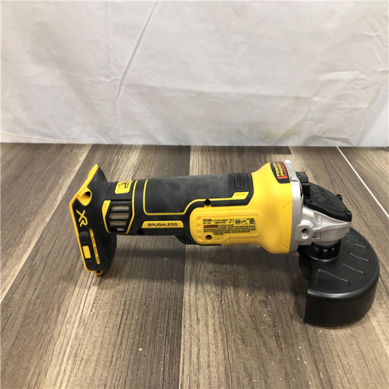 AS-IS DEWALT 20V MAX XR Cordless Brushless 4.5 in. Slide Switch Small Angle Grinder with Kickback Brake (Tool Only)