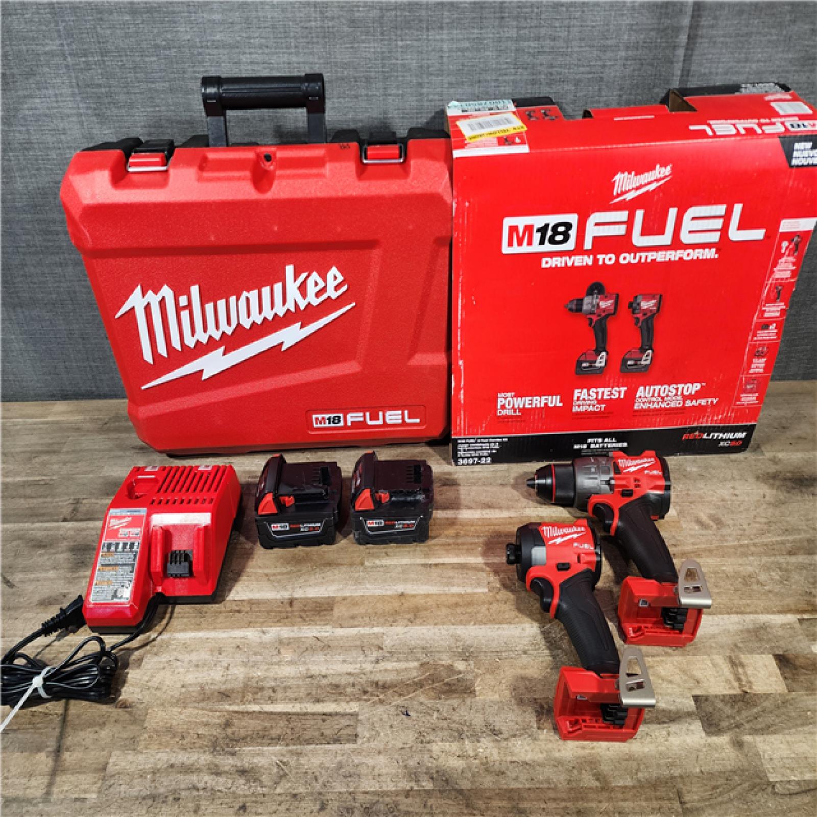 HOUSTON LOCATION - AS-IS (APPEARS LIKE NEW) Milwaukee FUEL 18V Lithium-Ion Brushless Cordless Hammer Drill and Impact Driver Combo Kit