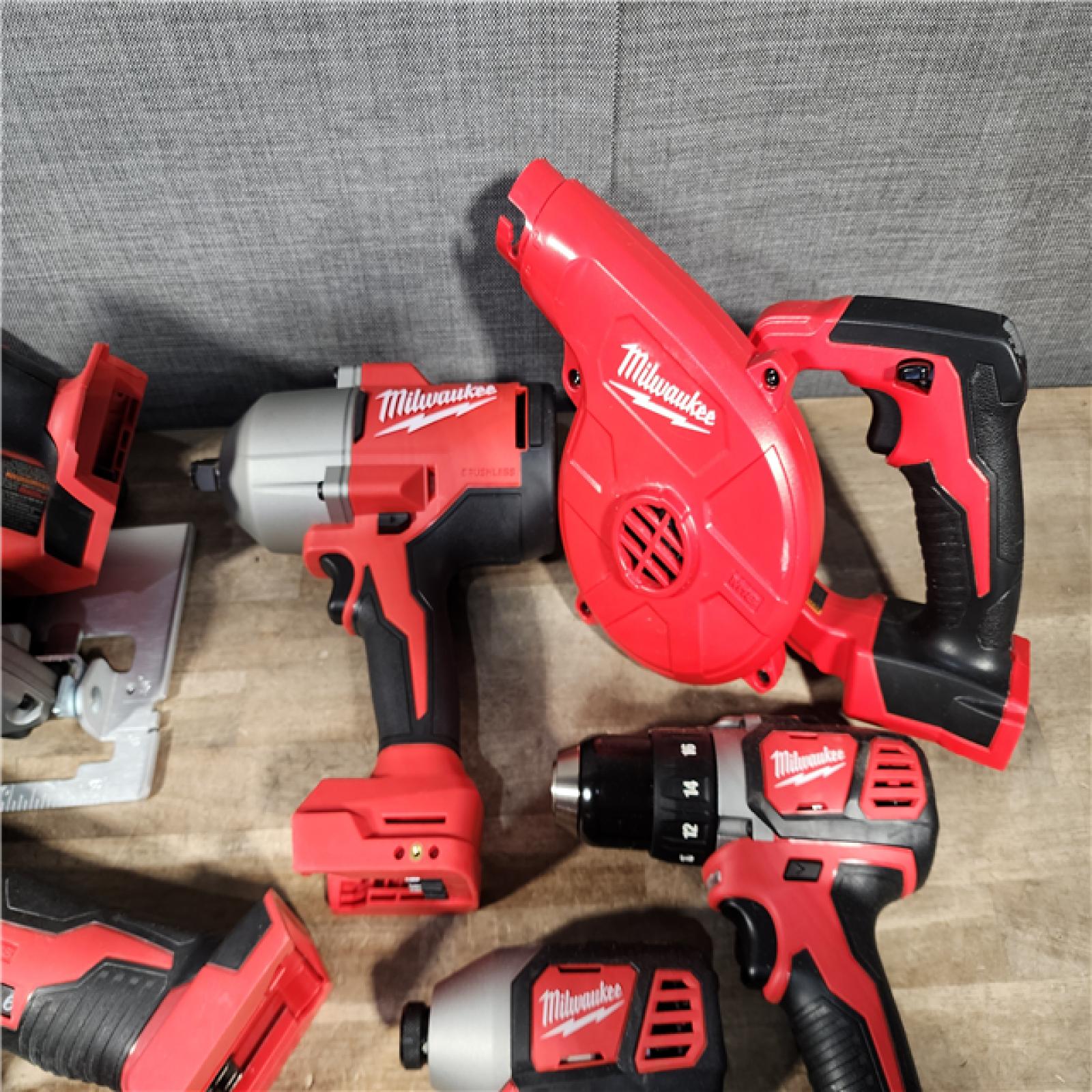 HOUSTON LOCATION - AS-IS Milwaukee M18 18-Volt Lithium-Ion Cordless Combo Kit (9-Tool) with (2) Batteries  Charger  and Tool Bag