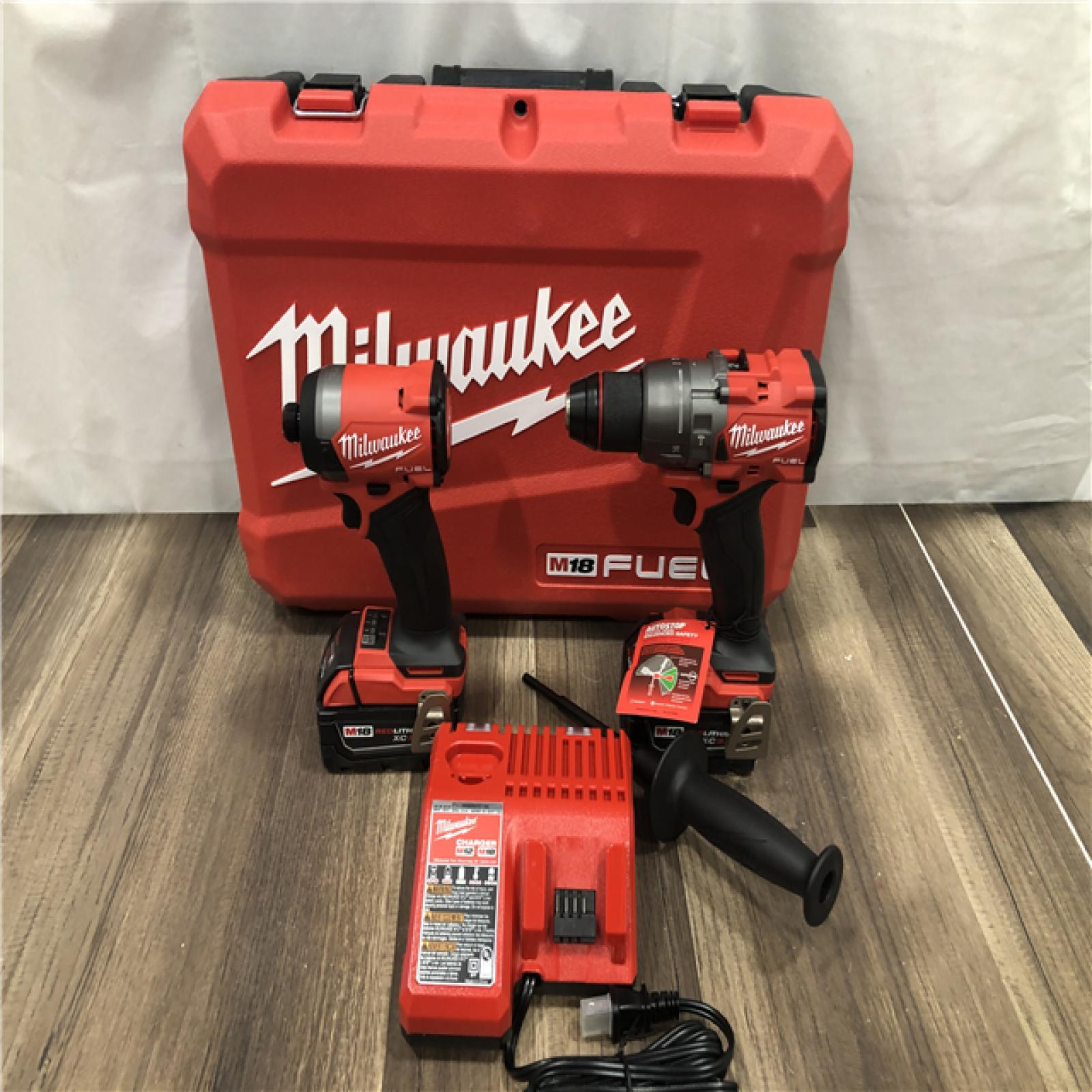 AS-IS Milwaukee FUEL 18V Lithium-Ion Brushless Cordless Hammer Drill and Impact Driver Combo Kit