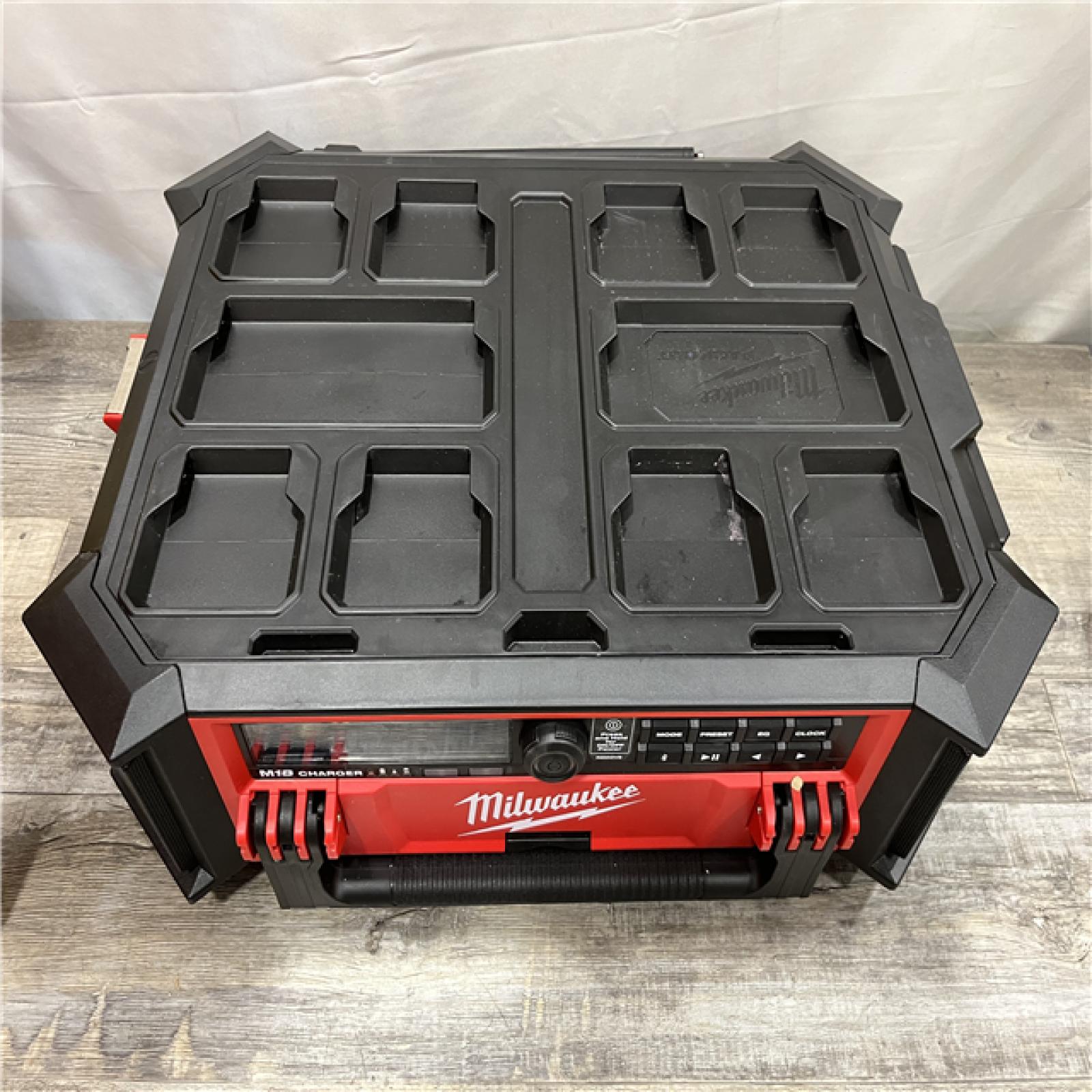 AS-IS Milwaukee  Lithium-Ion Cordless PACKOUT Radio/Speaker with Built-In Charger