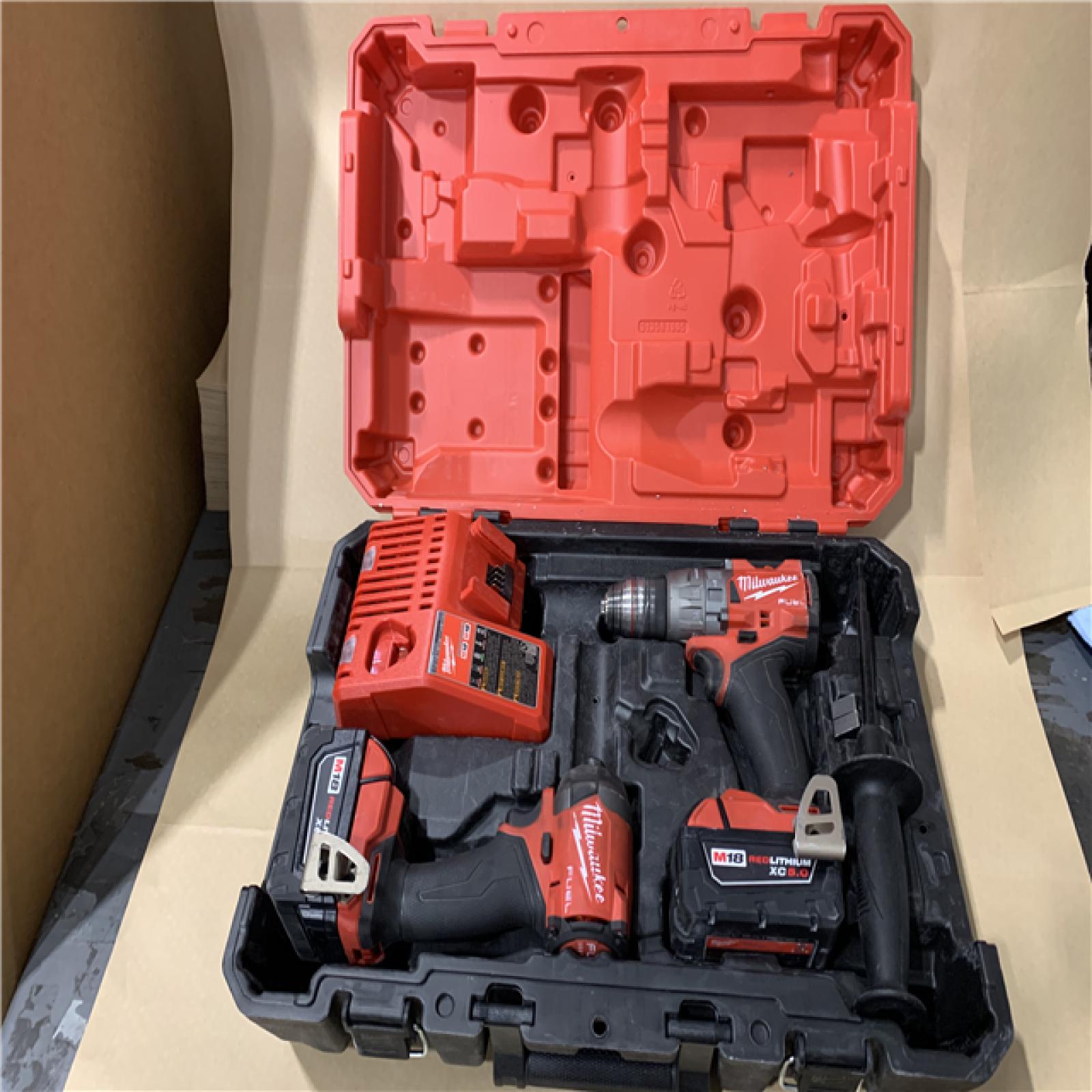 AS-IS - MILWAUKEE FUEL 18V Lithium-Ion Brushless Cordless Hammer Drill and Impact Driver Combo Kit (2-Tool) with 2 Batteries