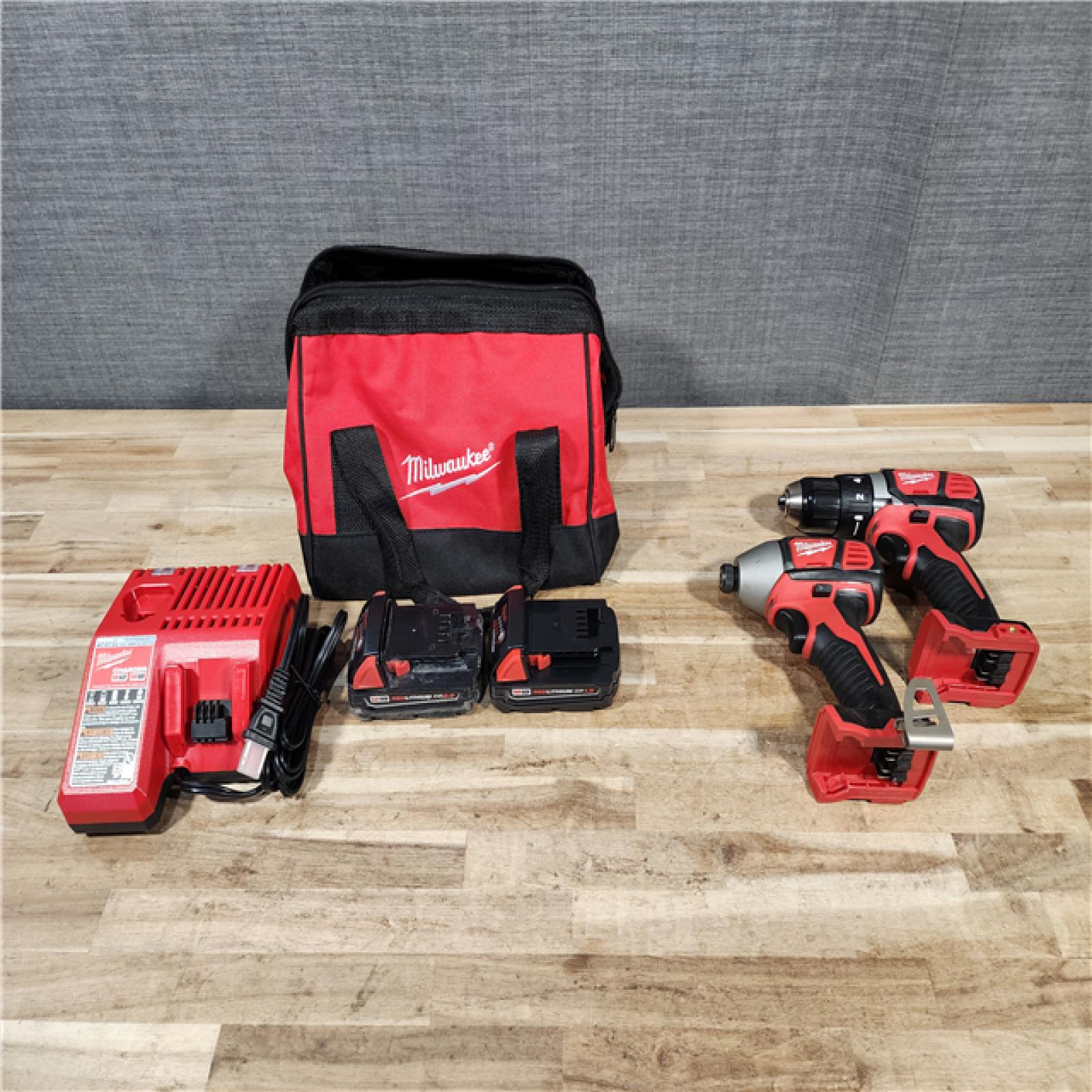HOUSTON LOCATION - AS-IS Milwaukee 18V Lithium-Ion Cordless Drill Driver/Impact Driver Combo Kit