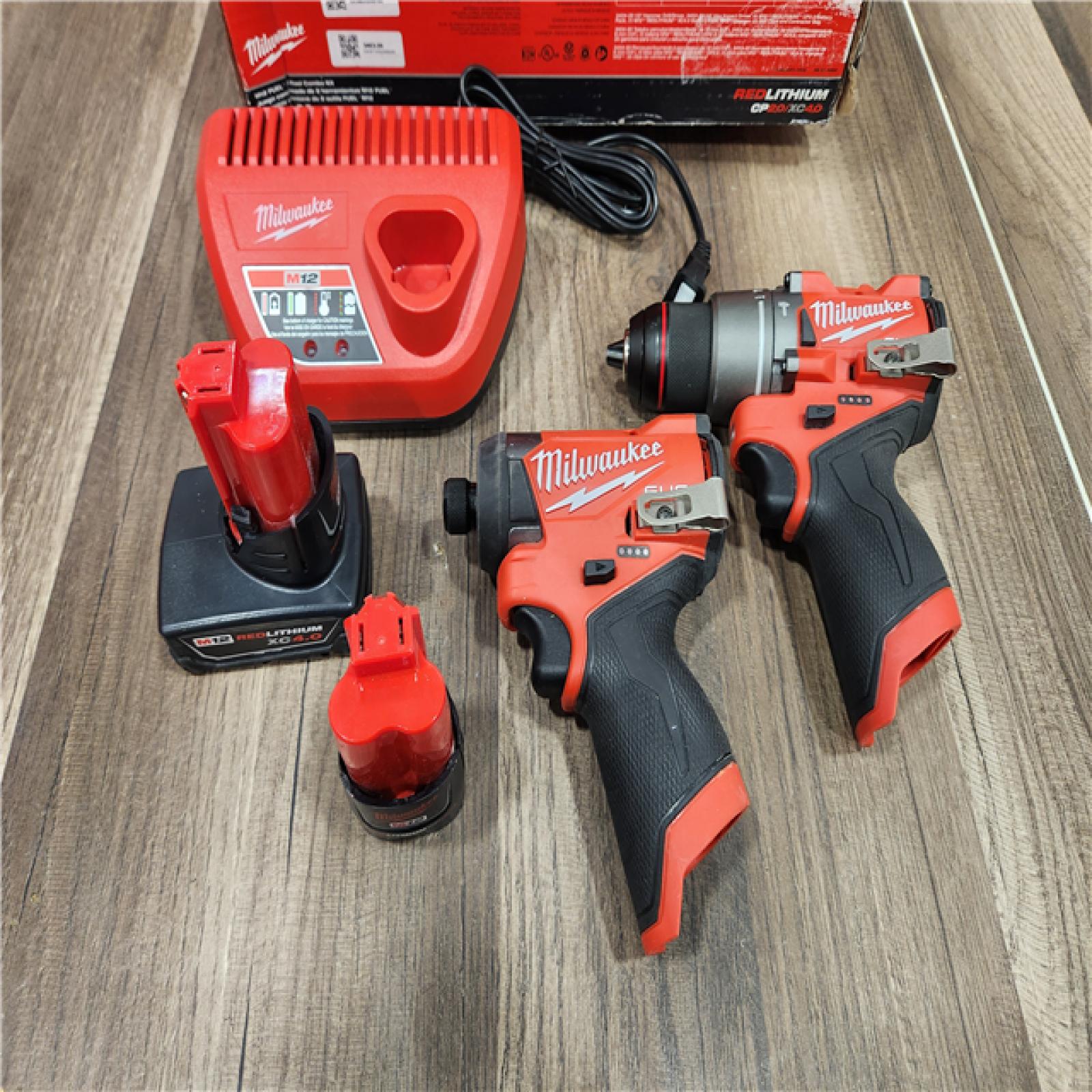 AS-IS Milwaukee 3497-22 12V Brushless Hammer Drill and Impact Driver Combo Kit