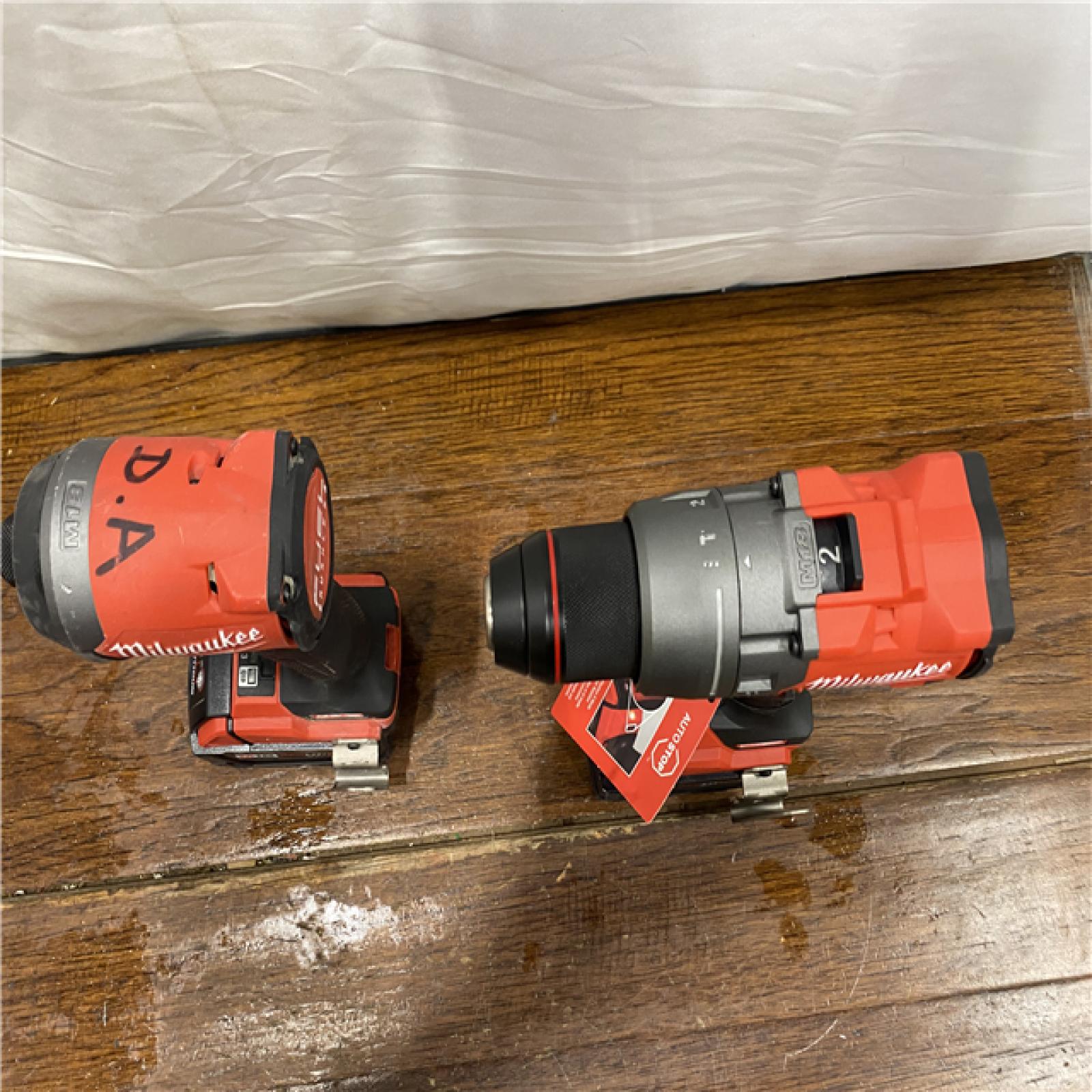 AS-IS MILWAUKEE M18 FUEL 18V Lithium-Ion Brushless Cordless Hammer Drill and Impact Driver Combo Kit (2-Tool) with 2 Batteries