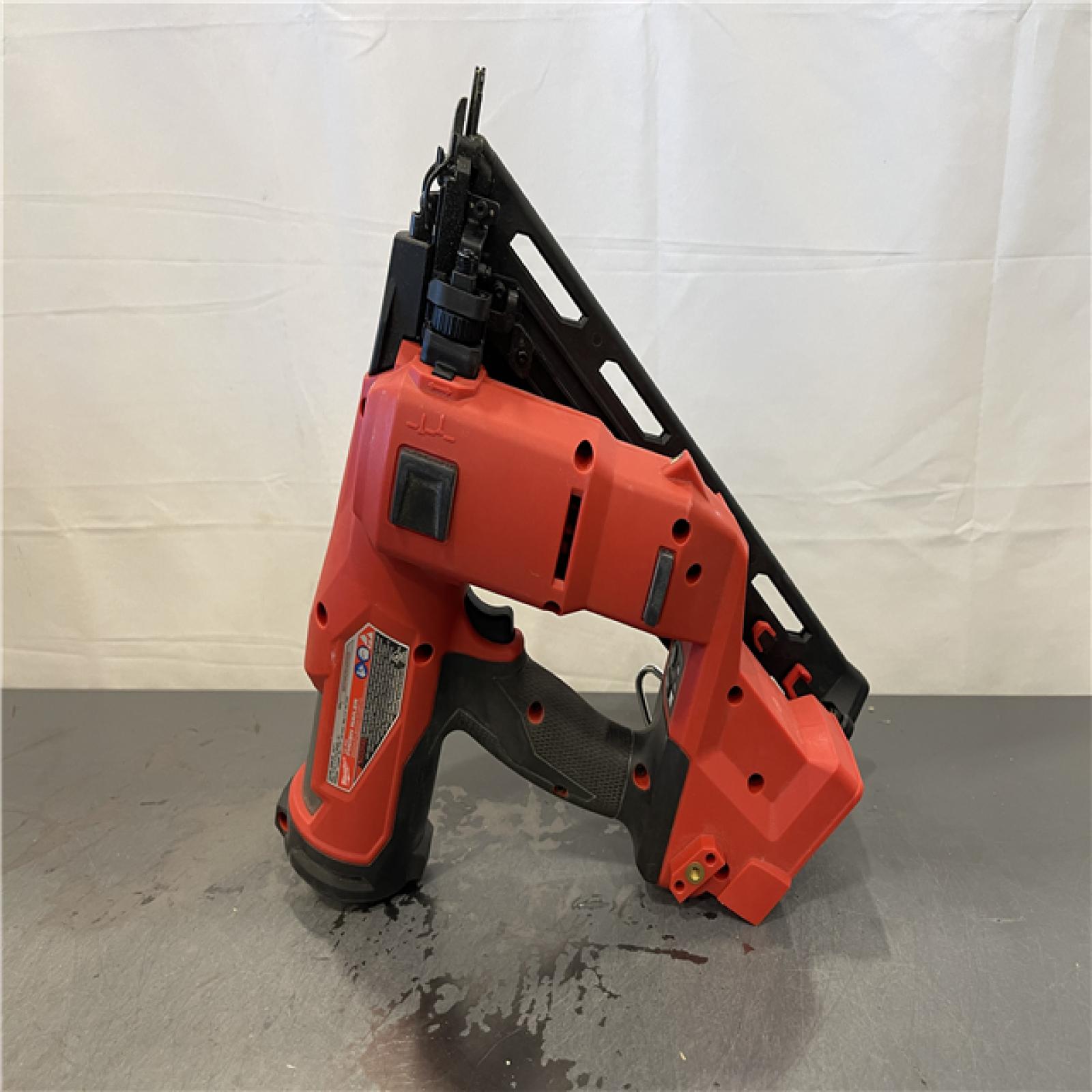 AS-IS - Milwaukee M18 FUEL 18-Volt Lithium-Ion Brushless Cordless Gen II 15-Gauge Angled Finish Nailer