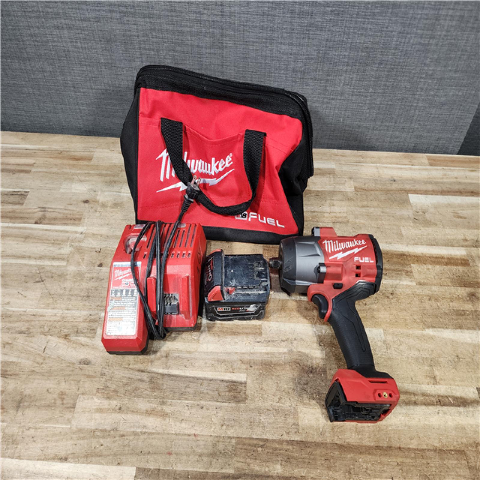 HOUSTON LOCATION - AS - IS Milwaukee M18 FUEL Brushless Cordless High-Torque 1/2 in. Impact Wrench W/Friction Ring Kit