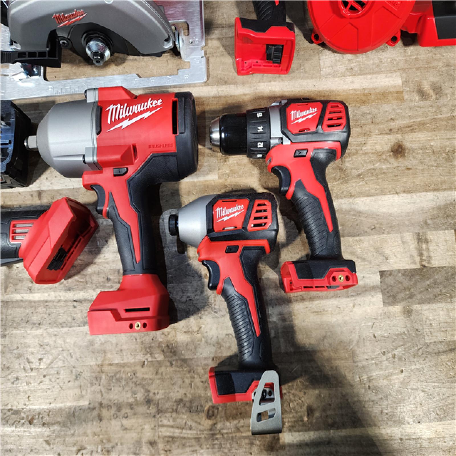 HOUSTON LOCATION - AS-IS Milwaukee M18 18-Volt Lithium-Ion Cordless Combo Kit (7-Tool) with (2) Batteries  Charger  and Tool Bag
