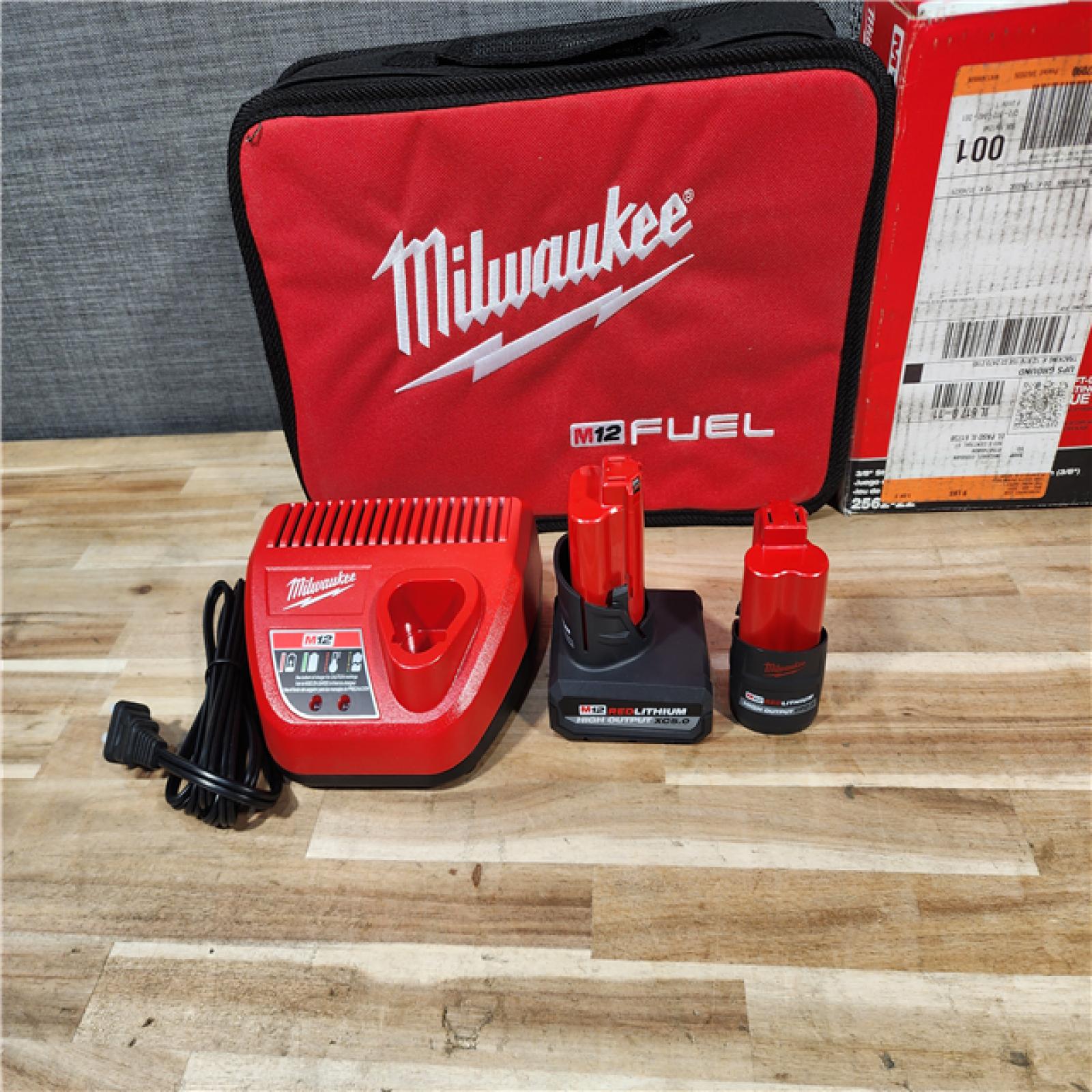 HOUSTON LOCATION - AS-IS (APPEARS LIKE NEW) Milwaukee FUEL 12V Li-Ion Brushless Cordless Stubby 3/8 in. Impact Wrench Kit