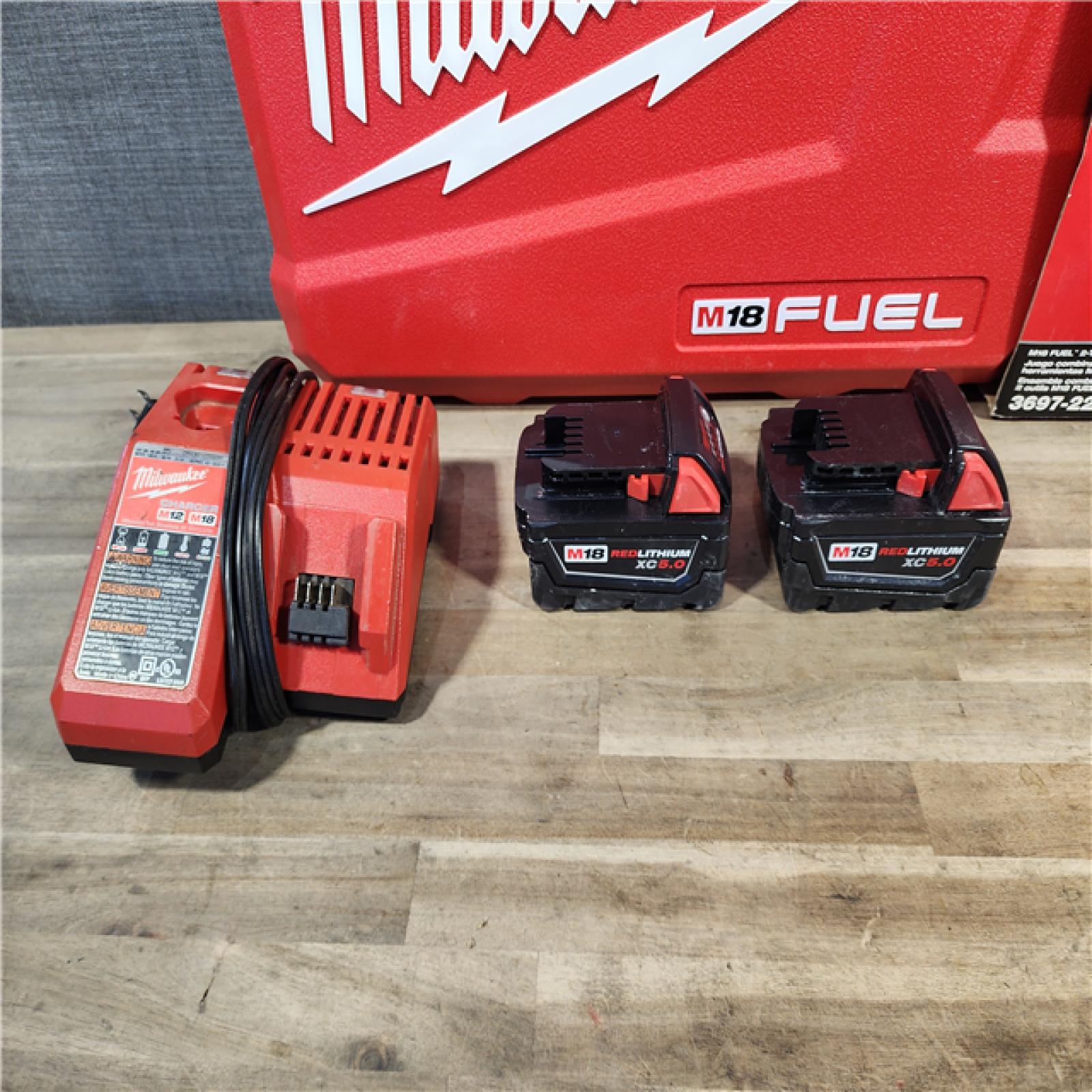 HOUSTON LOCATION - AS-IS MILWAUKEE FUEL 18V Lithium-Ion Brushless Cordless Hammer Drill and Impact Driver Combo Kit