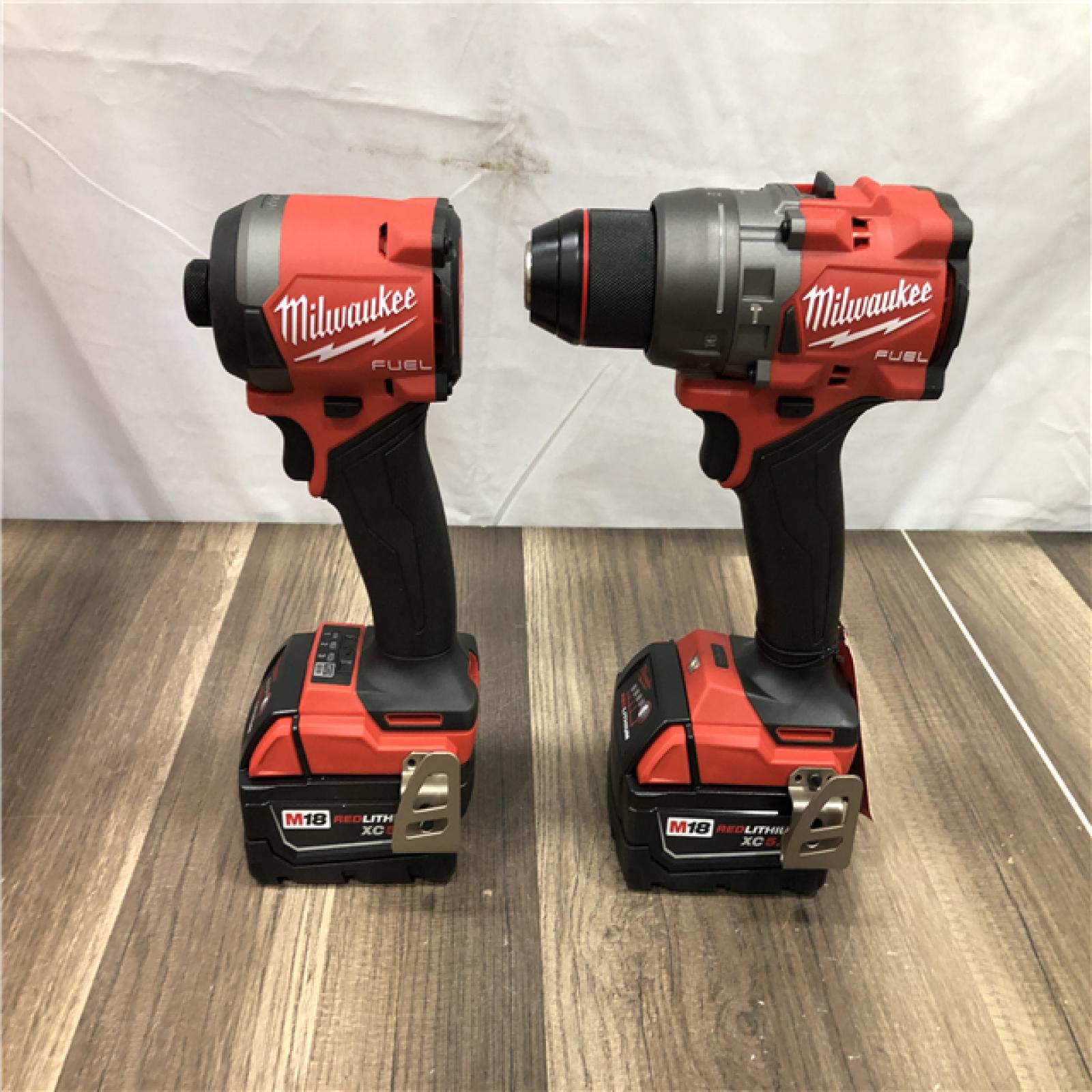AS-IS Milwaukee FUEL 18V Lithium-Ion Brushless Cordless Hammer Drill and Impact Driver Combo Kit