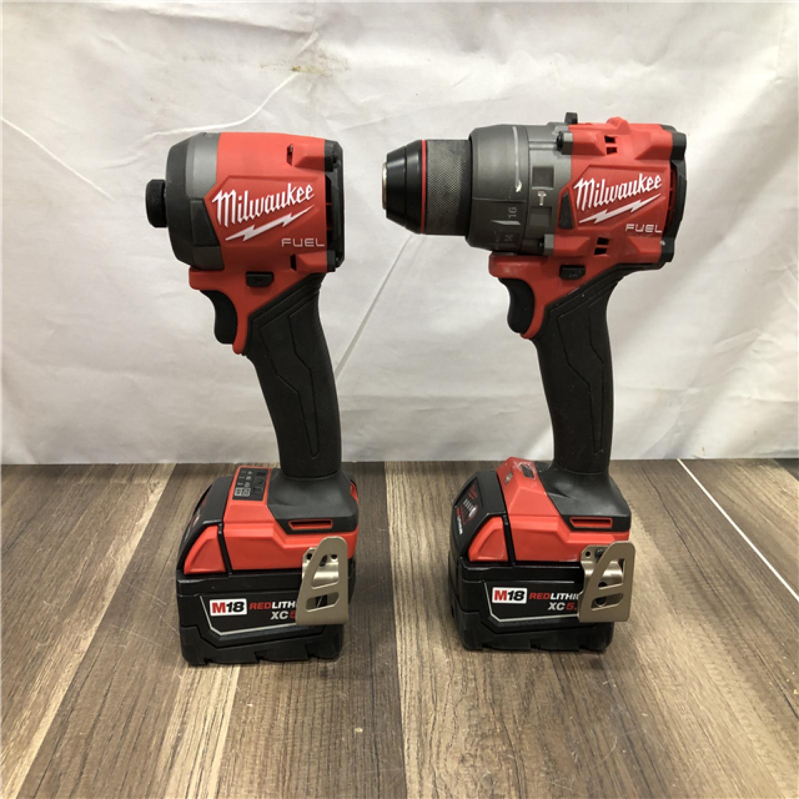 AS-IS Milwaukee FUEL 18V Lithium-Ion Brushless Cordless Hammer Drill and Impact Driver Combo Kit