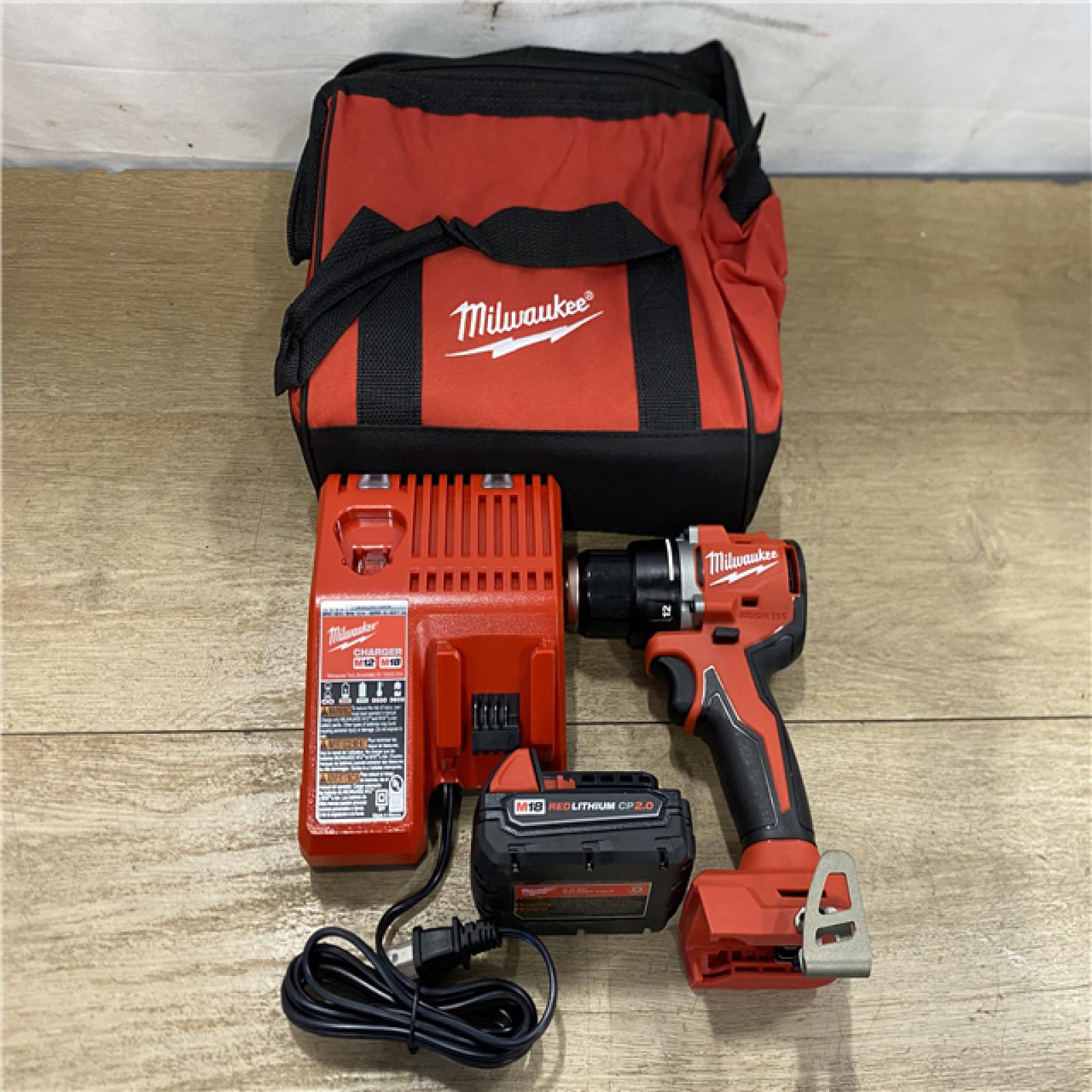 AS-IS Milwaukee 18V Lithium-Ion Brushless Cordless 1/2 in. Compact Drill/Driver with kit