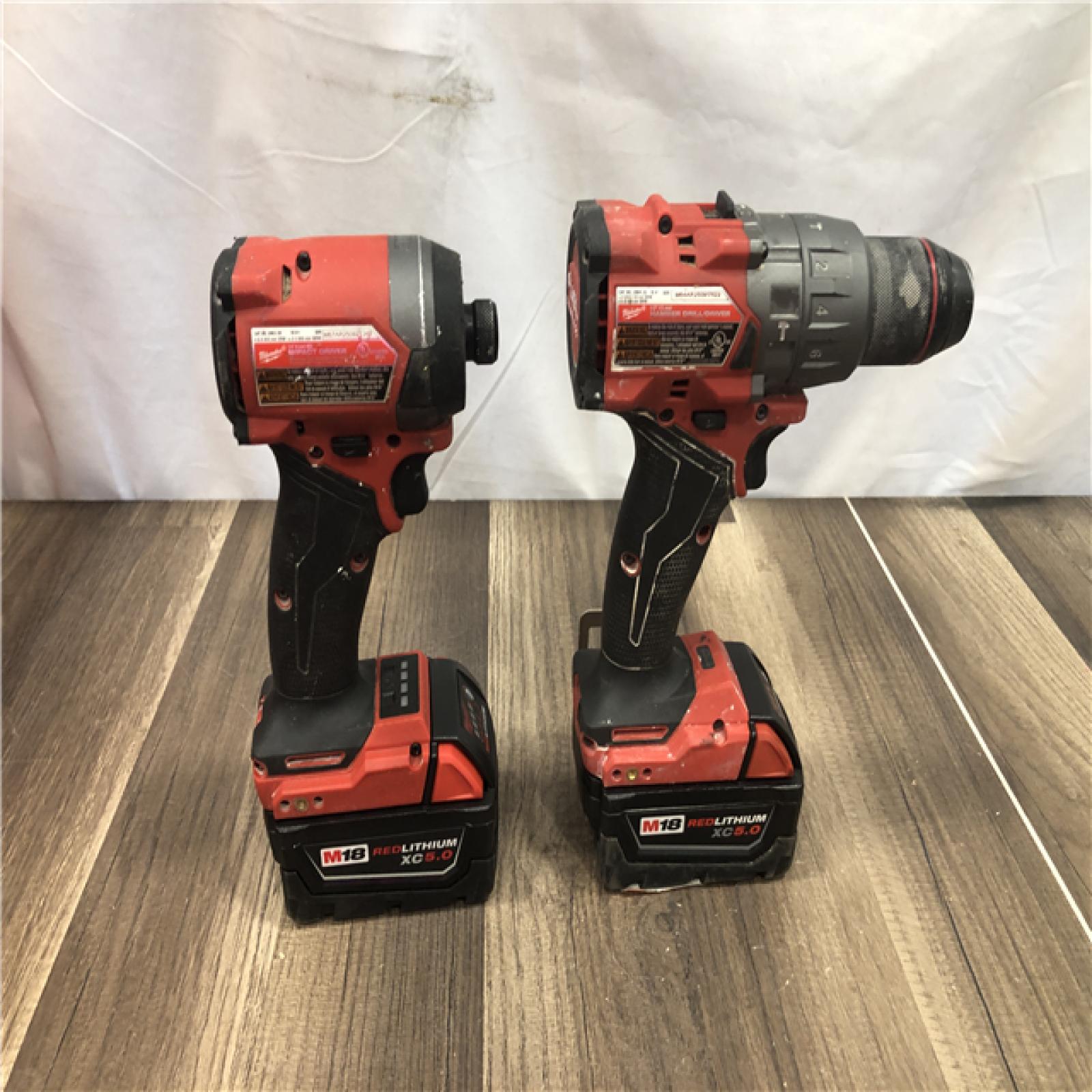 AS-IS Milwaukee FUEL 18V Lithium-Ion Brushless Cordless Hammer Drill and Impact Driver Combo Kit