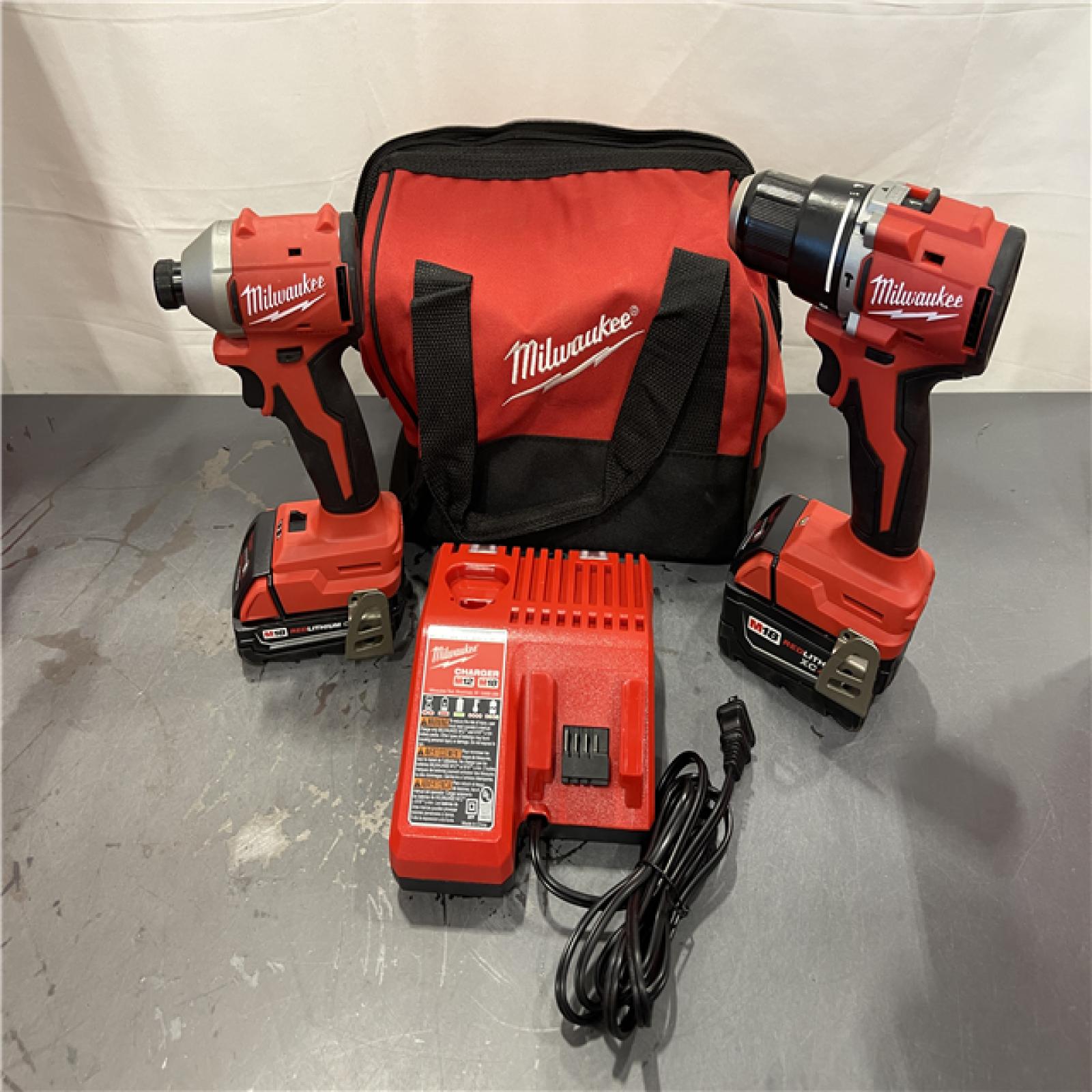 AS-IS - Milwaukee M18 18-Volt Lithium-Ion Brushless Cordless Compact Hammer Drill/Impact Combo Kit