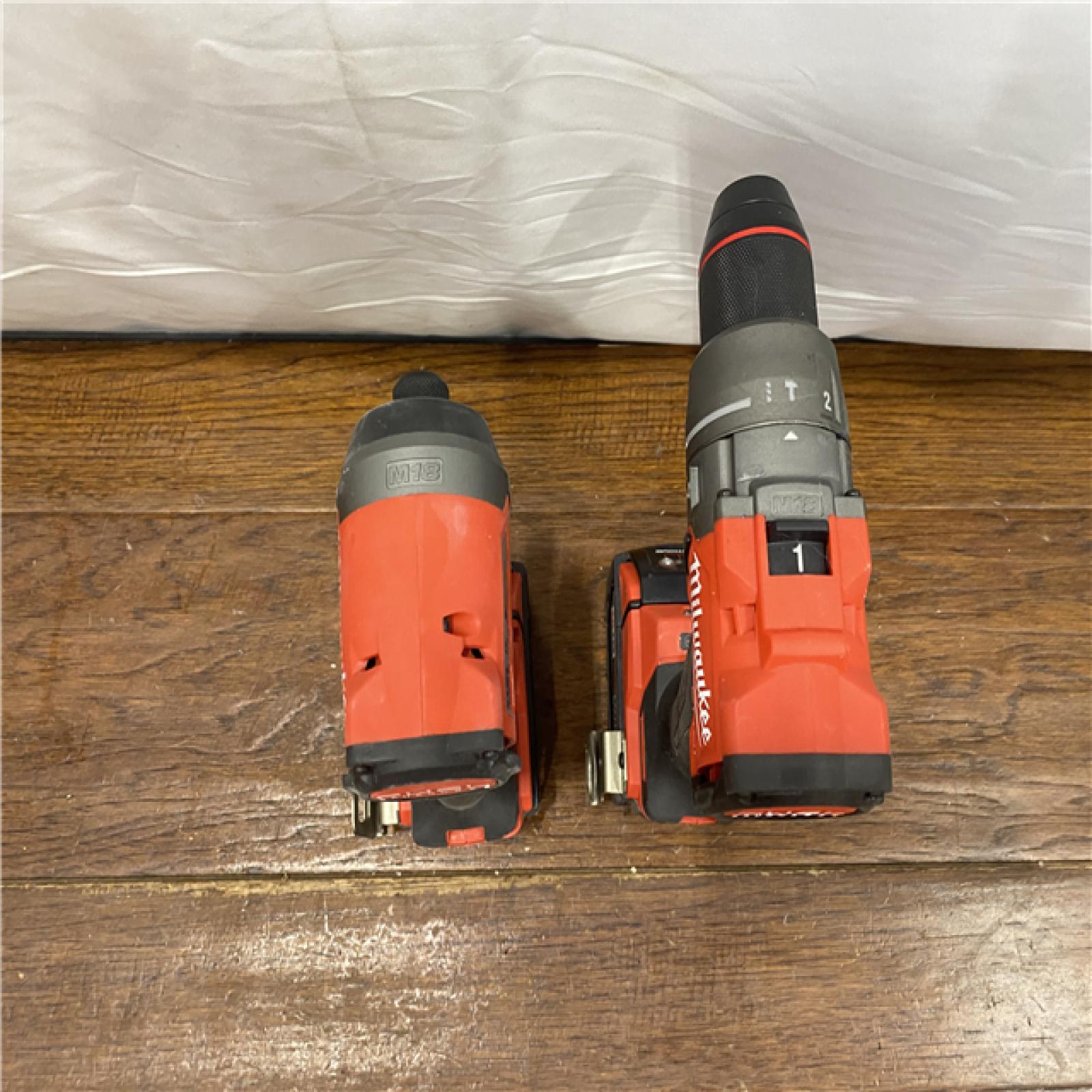 AS-IS MILWAUKEE M18 FUEL 18V Lithium-Ion Brushless Cordless Hammer Drill and Impact Driver Combo Kit (2-Tool) with 2 Batteries