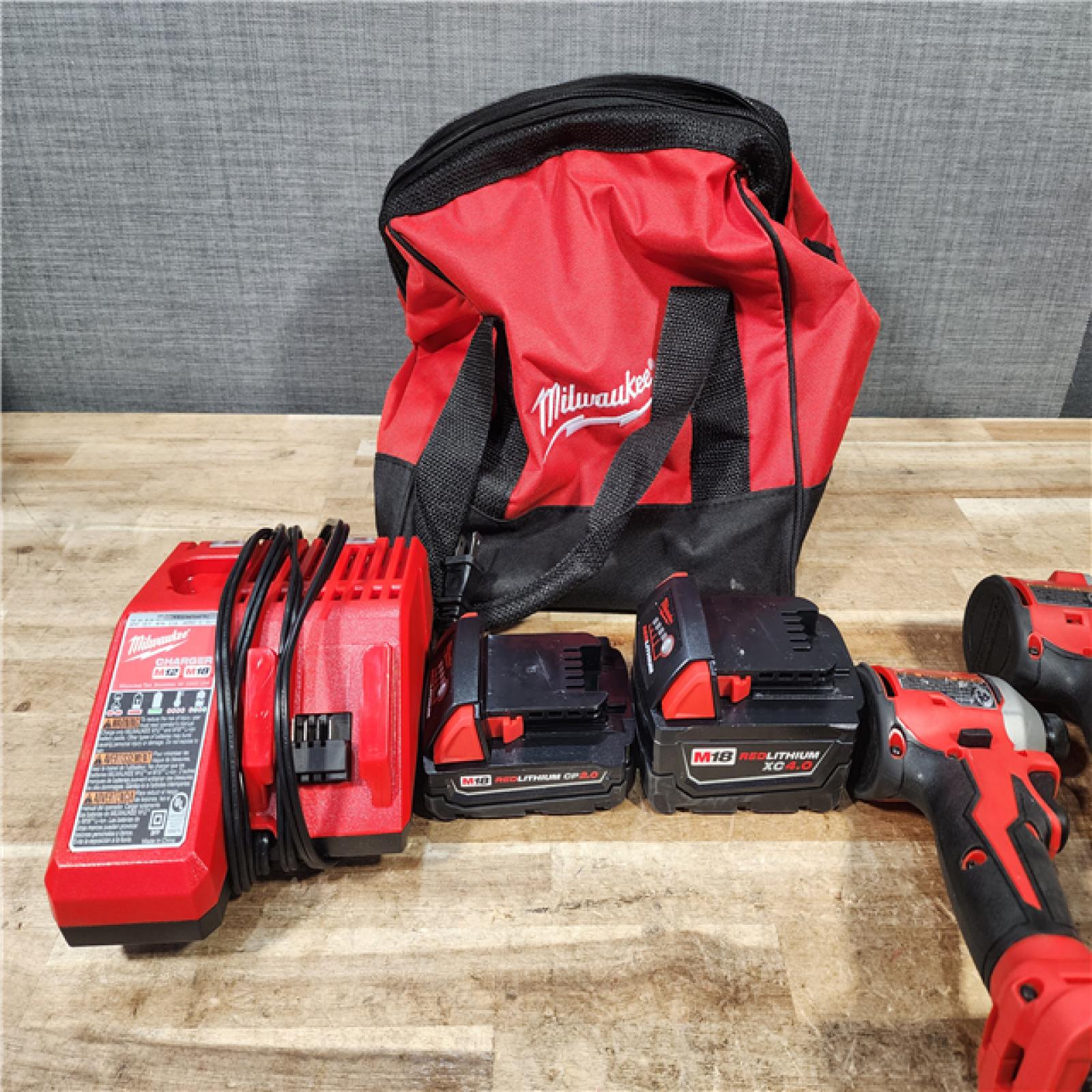 HOUSTON LOCATION - AS - IS Milwaukee 18-Volt Lithium-Ion Brushless Cordless Compact Hammer Drill/Impact Combo Kit