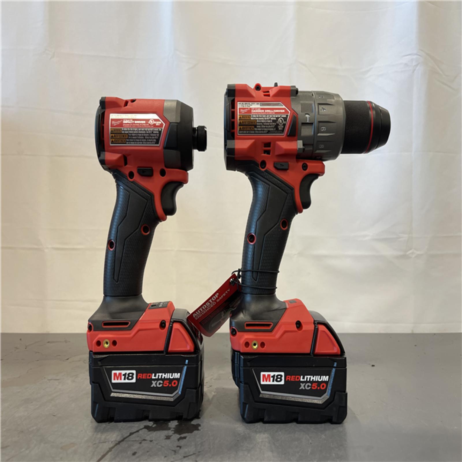AS-IS - MILWAUKEE FUEL 18V Lithium-Ion Brushless Cordless Hammer Drill and Impact Driver Combo Kit