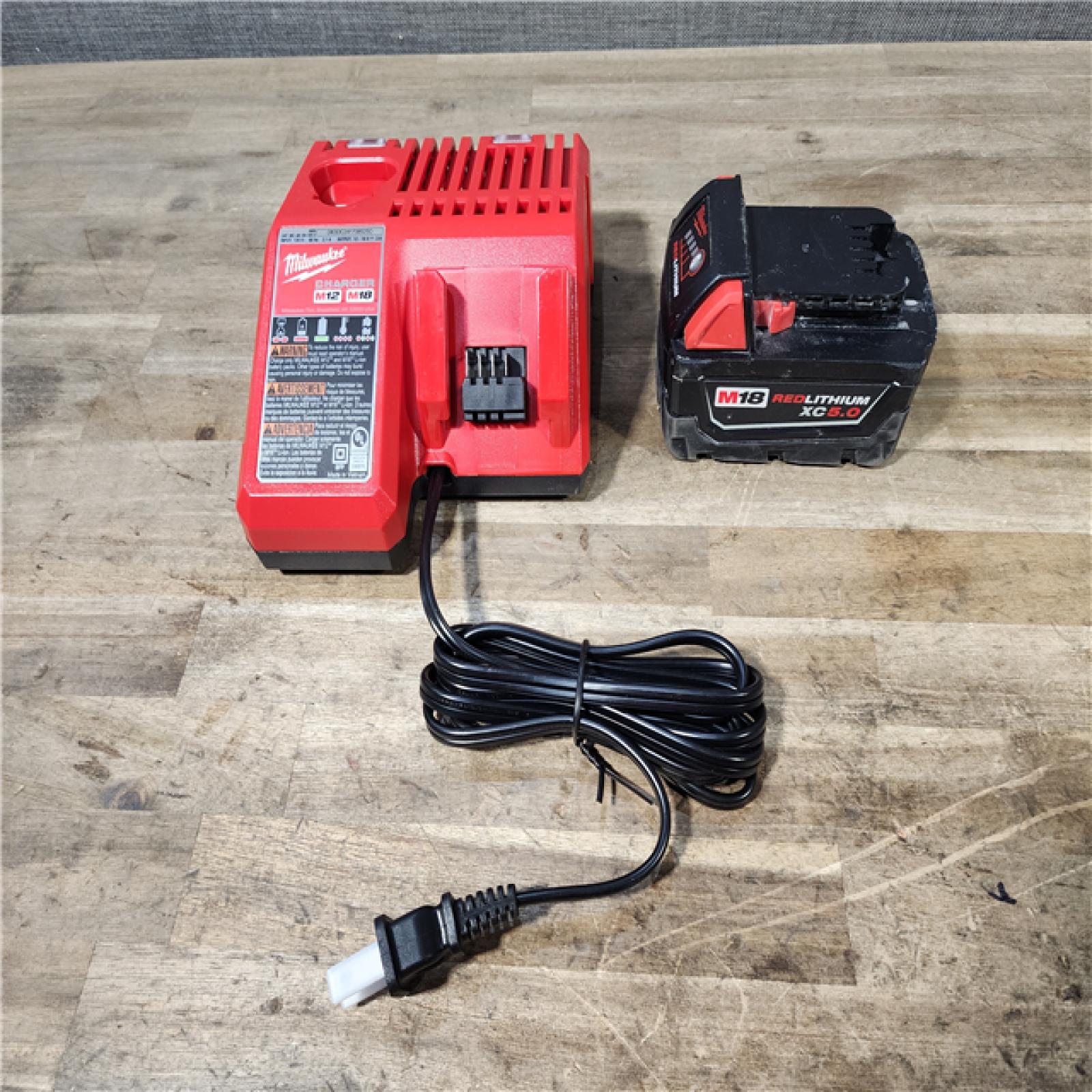 HOUSTON LOCATION - AS-IS Milwaukee 2962-20  M18 18V Fuel 1/2 Mid-Torque Impact Wrench Cordless Lithium-Ion Brushless W/ BATTERY & CHARGER