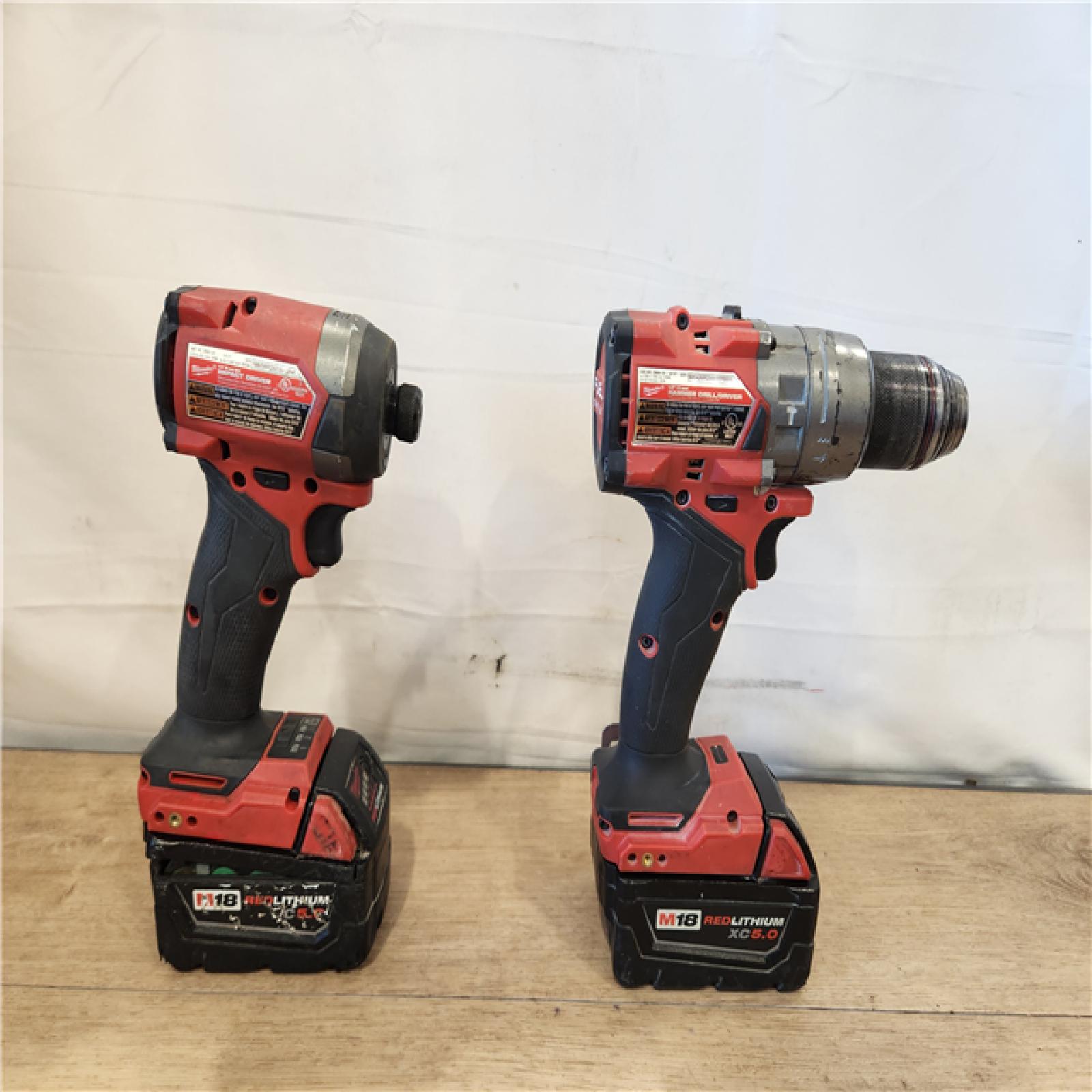 AS-IS- Milwaukee FUEL 18V Lithium-Ion Brushless Cordless Hammer Drill and Impact Driver Combo Kit