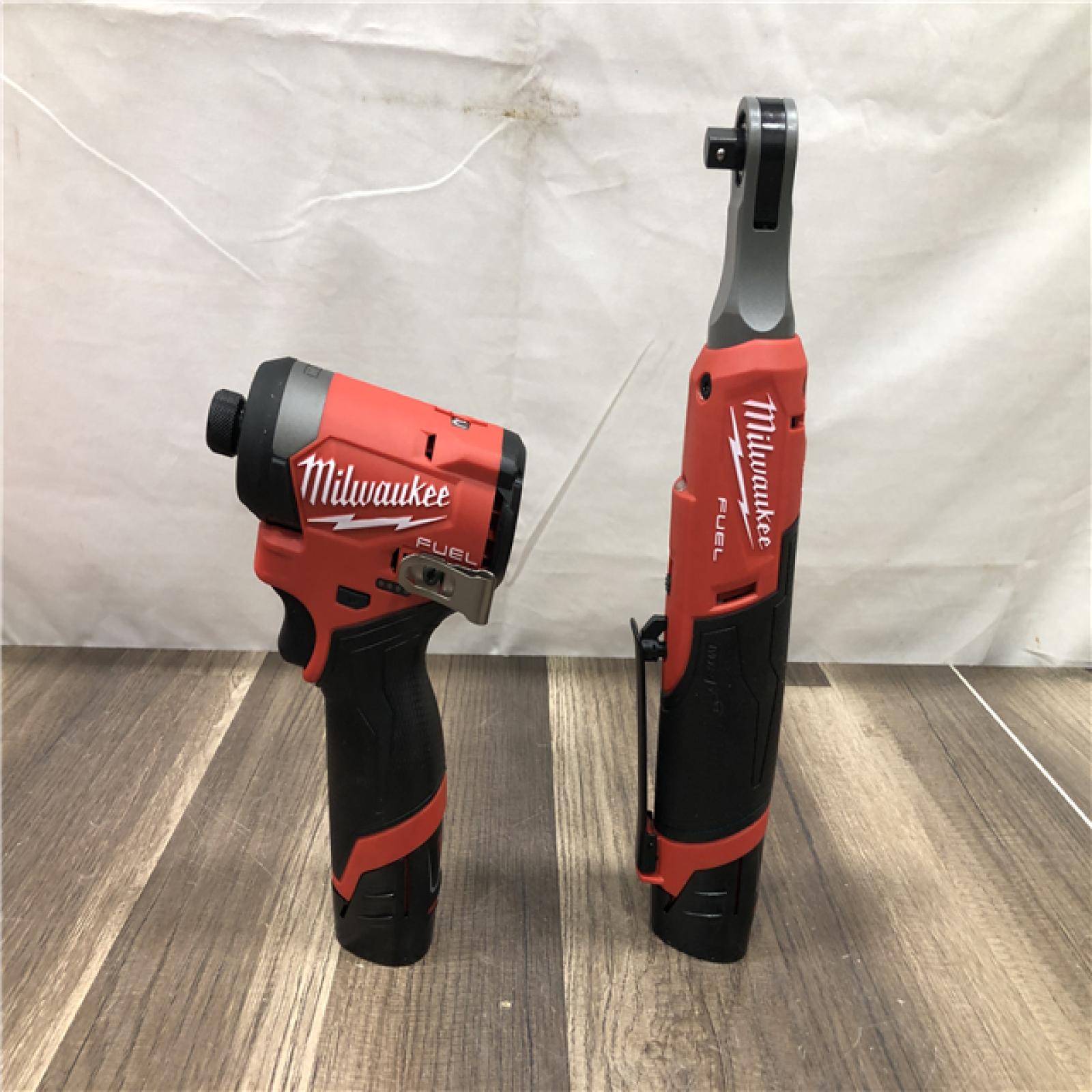 AS-IS Milwaukee FUEL 12V Lithium-Ion Cordless 3/8 in. Ratchet and 1/4 in. Impact Driver Kit
